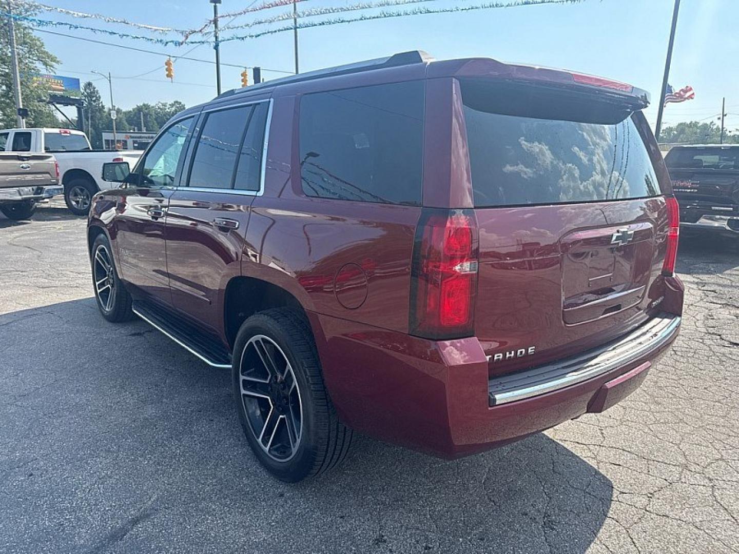 2020 RED /BEIGE Chevrolet Tahoe Premier 4WD (1GNSKCKC6LR) with an 5.3L V8 OHV 16V engine, 6A transmission, located at 3304 Woodville Road, Northwood, OH, 43619, (419) 210-8019, 41.612694, -83.480743 - Your #1 Destination for Auto Loans and mdash;No Matter Your Credit!At our dealership, we believe everyone deserves the opportunity to drive their dream car and mdash;whether you have good credit, bad credit, or no credit at all. With a wide selection of hundreds of cars, trucks, and SUVs, you'll fin- Photo#2