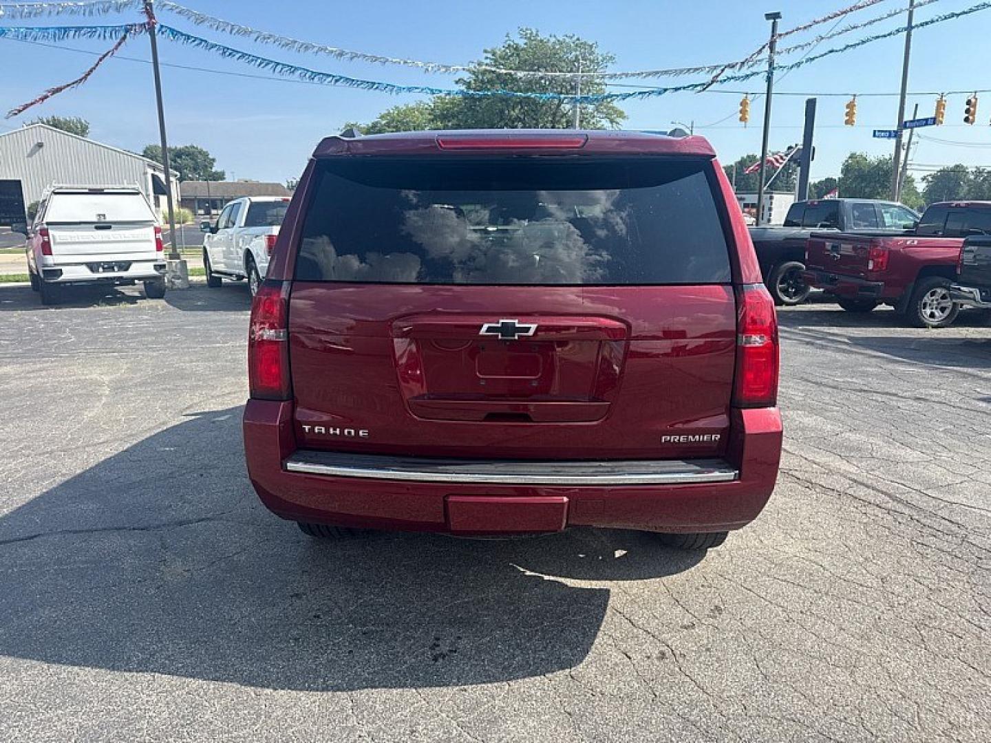 2020 RED /BEIGE Chevrolet Tahoe Premier 4WD (1GNSKCKC6LR) with an 5.3L V8 OHV 16V engine, 6A transmission, located at 3304 Woodville Road, Northwood, OH, 43619, (419) 210-8019, 41.612694, -83.480743 - Your #1 Destination for Auto Loans and mdash;No Matter Your Credit!At our dealership, we believe everyone deserves the opportunity to drive their dream car and mdash;whether you have good credit, bad credit, or no credit at all. With a wide selection of hundreds of cars, trucks, and SUVs, you'll fin- Photo#3