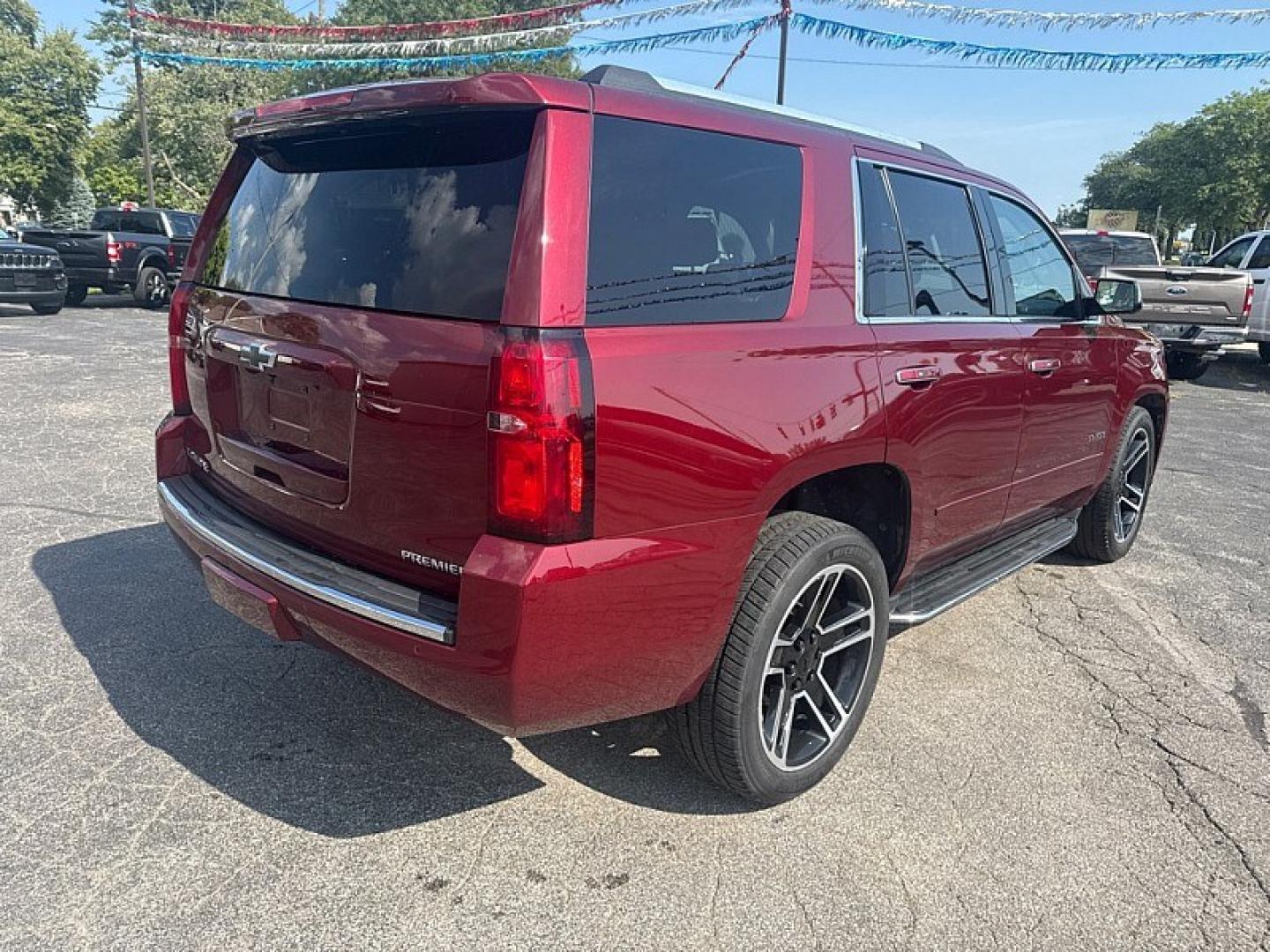 2020 RED /BEIGE Chevrolet Tahoe Premier 4WD (1GNSKCKC6LR) with an 5.3L V8 OHV 16V engine, 6A transmission, located at 3304 Woodville Road, Northwood, OH, 43619, (419) 210-8019, 41.612694, -83.480743 - Your #1 Destination for Auto Loans and mdash;No Matter Your Credit!At our dealership, we believe everyone deserves the opportunity to drive their dream car and mdash;whether you have good credit, bad credit, or no credit at all. With a wide selection of hundreds of cars, trucks, and SUVs, you'll fin- Photo#4