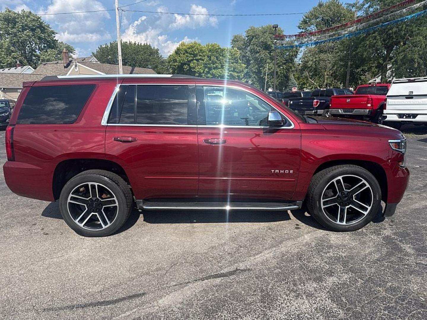 2020 RED /BEIGE Chevrolet Tahoe Premier 4WD (1GNSKCKC6LR) with an 5.3L V8 OHV 16V engine, 6A transmission, located at 3304 Woodville Road, Northwood, OH, 43619, (419) 210-8019, 41.612694, -83.480743 - Your #1 Destination for Auto Loans and mdash;No Matter Your Credit!At our dealership, we believe everyone deserves the opportunity to drive their dream car and mdash;whether you have good credit, bad credit, or no credit at all. With a wide selection of hundreds of cars, trucks, and SUVs, you'll fin- Photo#5