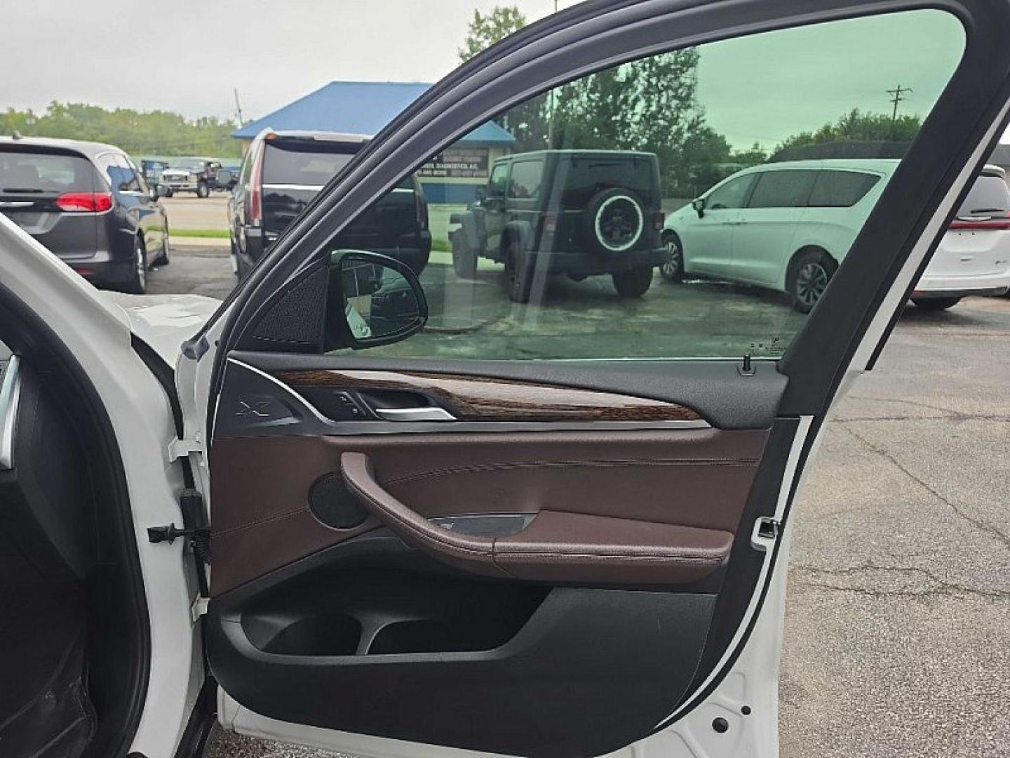 2020 WHITE /BROWN BMW X3 xDrive30e (5UXTS1C03L9) with an 2.0L L4 DOHC 16V HYBRID engine, 8A transmission, located at 3304 Woodville Road, Northwood, OH, 43619, (419) 210-8019, 41.612694, -83.480743 - Your #1 Destination for Auto Loans and mdash;No Matter Your Credit!At our dealership, we believe everyone deserves the opportunity to drive their dream car and mdash;whether you have good credit, bad credit, or no credit at all. With a wide selection of hundreds of cars, trucks, and SUVs, you'll fin- Photo#15