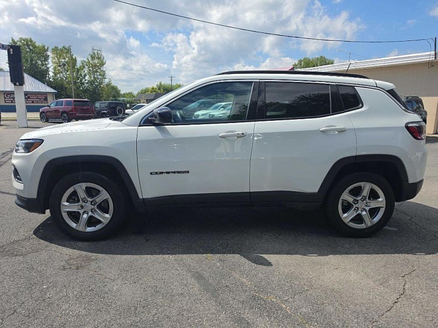 2023 WHITE /BLACK Jeep Compass Latitude (3C4NJDBN2PT) with an 2.0L L4 DOHC 16V TURBO engine, Automatic 8-Spd transmission, located at 3304 Woodville Road, Northwood, OH, 43619, (419) 210-8019, 41.612694, -83.480743 - Your #1 Destination for Auto Loans and mdash;No Matter Your Credit!At our dealership, we believe everyone deserves the opportunity to drive their dream car and mdash;whether you have good credit, bad credit, or no credit at all. With a wide selection of hundreds of cars, trucks, and SUVs, you'll fin- Photo#2