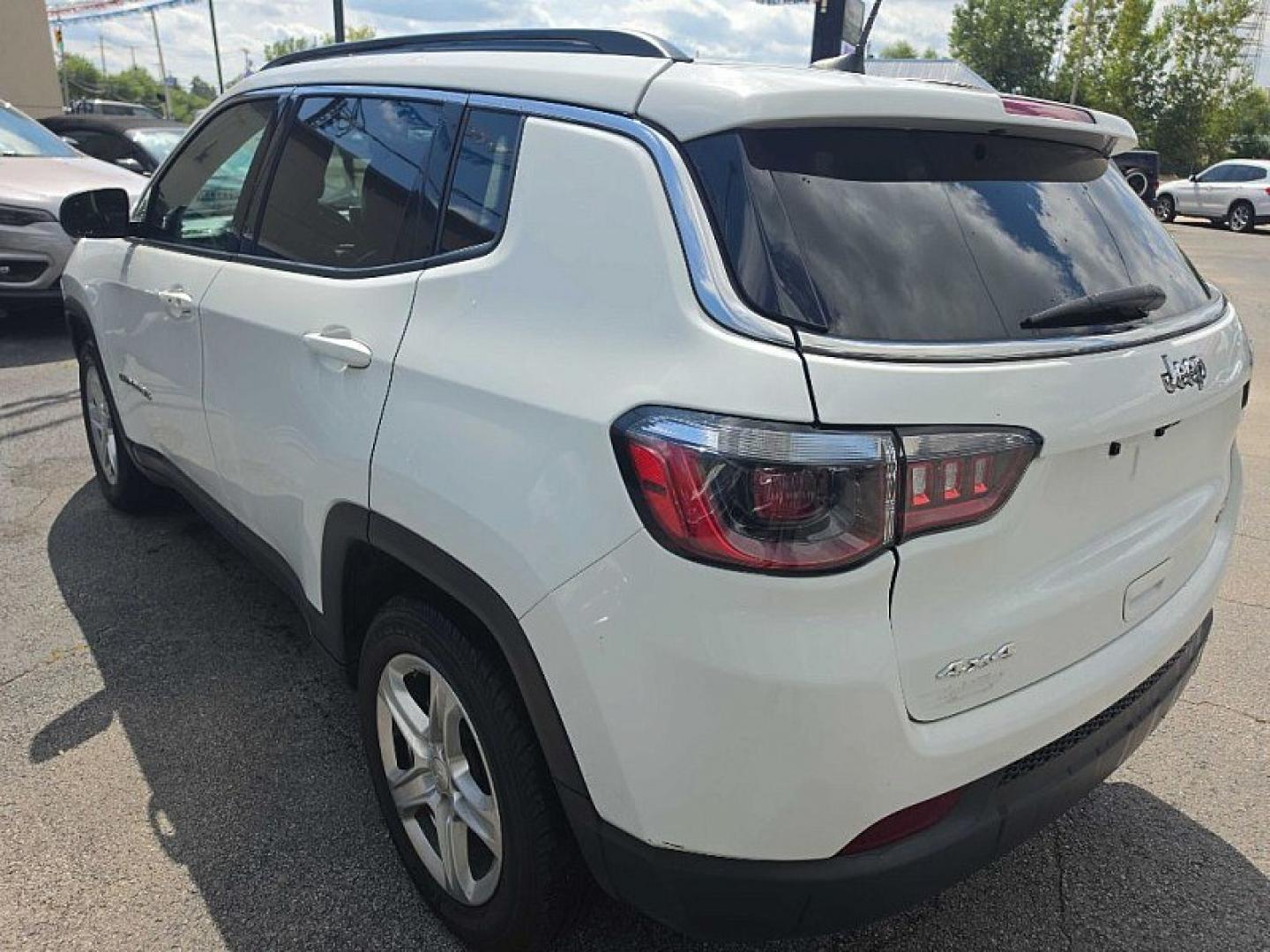 2023 WHITE /BLACK Jeep Compass Latitude (3C4NJDBN2PT) with an 2.0L L4 DOHC 16V TURBO engine, Automatic 8-Spd transmission, located at 3304 Woodville Road, Northwood, OH, 43619, (419) 210-8019, 41.612694, -83.480743 - Your #1 Destination for Auto Loans and mdash;No Matter Your Credit!At our dealership, we believe everyone deserves the opportunity to drive their dream car and mdash;whether you have good credit, bad credit, or no credit at all. With a wide selection of hundreds of cars, trucks, and SUVs, you'll fin- Photo#3
