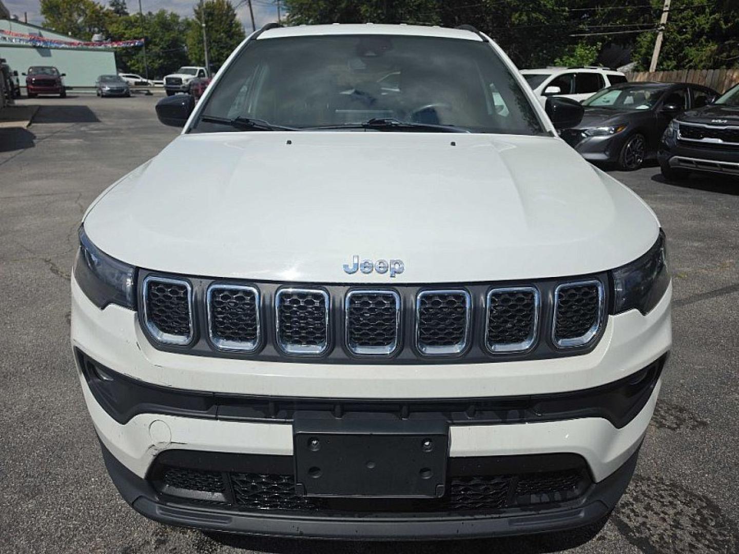 2023 WHITE /BLACK Jeep Compass Latitude (3C4NJDBN2PT) with an 2.0L L4 DOHC 16V TURBO engine, Automatic 8-Spd transmission, located at 3304 Woodville Road, Northwood, OH, 43619, (419) 210-8019, 41.612694, -83.480743 - Your #1 Destination for Auto Loans and mdash;No Matter Your Credit!At our dealership, we believe everyone deserves the opportunity to drive their dream car and mdash;whether you have good credit, bad credit, or no credit at all. With a wide selection of hundreds of cars, trucks, and SUVs, you'll fin- Photo#7