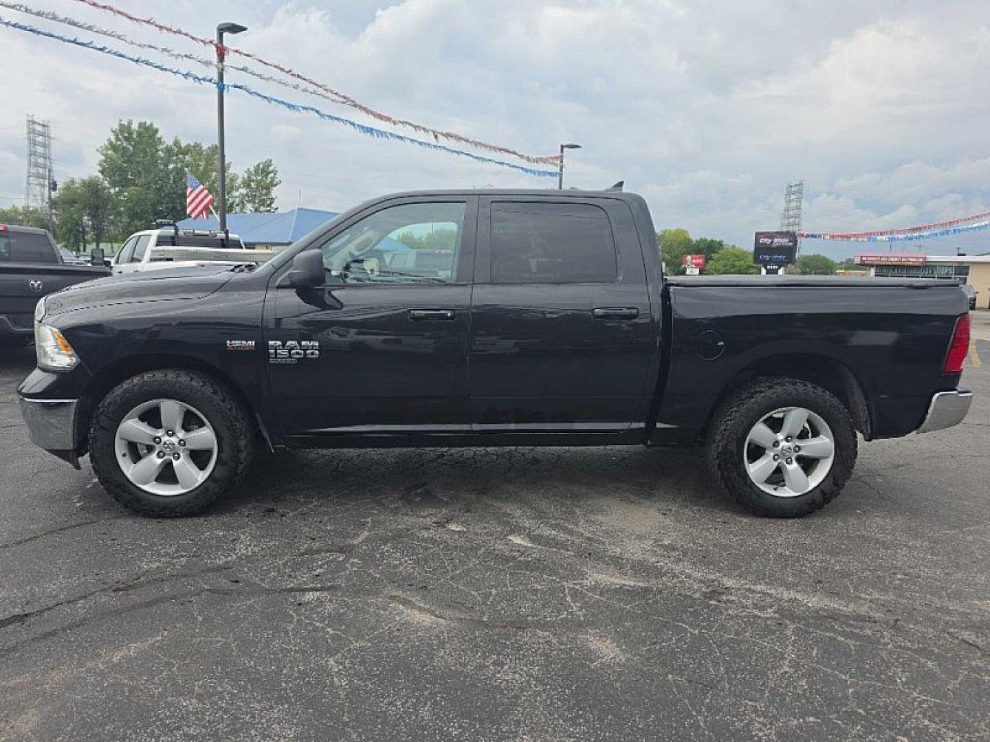 2019 BLACK /BLACK RAM 1500 SLT Crew Cab SWB 4WD (1C6RR7LT9KS) with an 5.7L V8 OHV 16V engine, 8A transmission, located at 3304 Woodville Road, Northwood, OH, 43619, (419) 210-8019, 41.612694, -83.480743 - Your #1 Destination for Auto Loans and mdash;No Matter Your Credit!At our dealership, we believe everyone deserves the opportunity to drive their dream car and mdash;whether you have good credit, bad credit, or no credit at all. With a wide selection of hundreds of cars, trucks, and SUVs, you'll fin- Photo#1