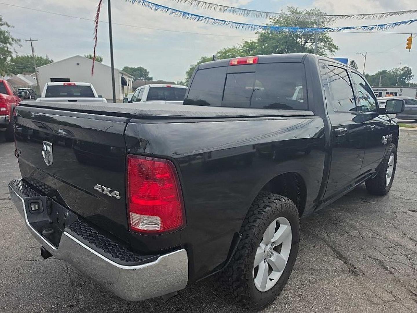 2019 BLACK /BLACK RAM 1500 SLT Crew Cab SWB 4WD (1C6RR7LT9KS) with an 5.7L V8 OHV 16V engine, 8A transmission, located at 3304 Woodville Road, Northwood, OH, 43619, (419) 210-8019, 41.612694, -83.480743 - Your #1 Destination for Auto Loans and mdash;No Matter Your Credit!At our dealership, we believe everyone deserves the opportunity to drive their dream car and mdash;whether you have good credit, bad credit, or no credit at all. With a wide selection of hundreds of cars, trucks, and SUVs, you'll fin- Photo#4