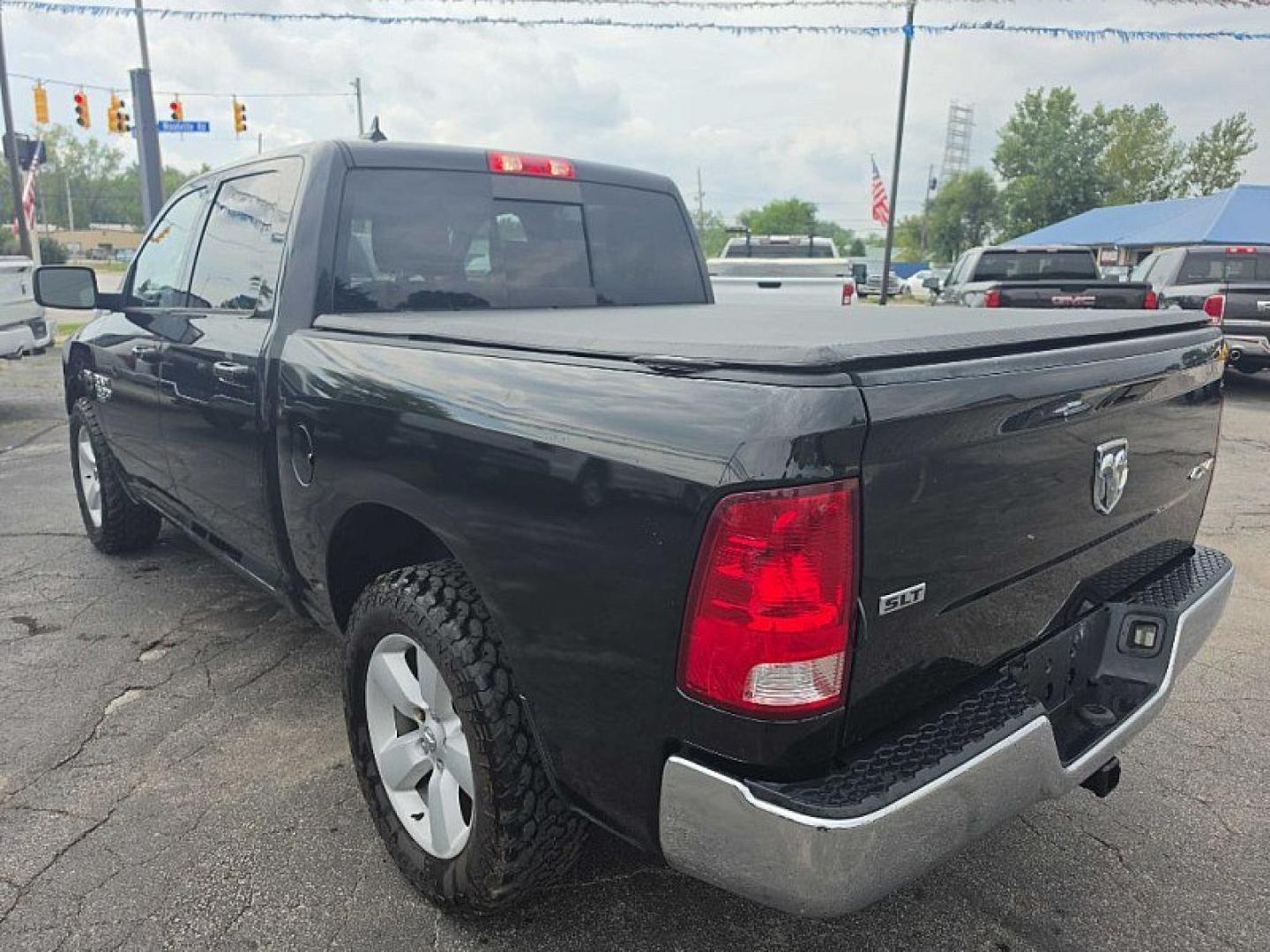 2019 BLACK /BLACK RAM 1500 SLT Crew Cab SWB 4WD (1C6RR7LT9KS) with an 5.7L V8 OHV 16V engine, 8A transmission, located at 3304 Woodville Road, Northwood, OH, 43619, (419) 210-8019, 41.612694, -83.480743 - Your #1 Destination for Auto Loans and mdash;No Matter Your Credit!At our dealership, we believe everyone deserves the opportunity to drive their dream car and mdash;whether you have good credit, bad credit, or no credit at all. With a wide selection of hundreds of cars, trucks, and SUVs, you'll fin- Photo#2