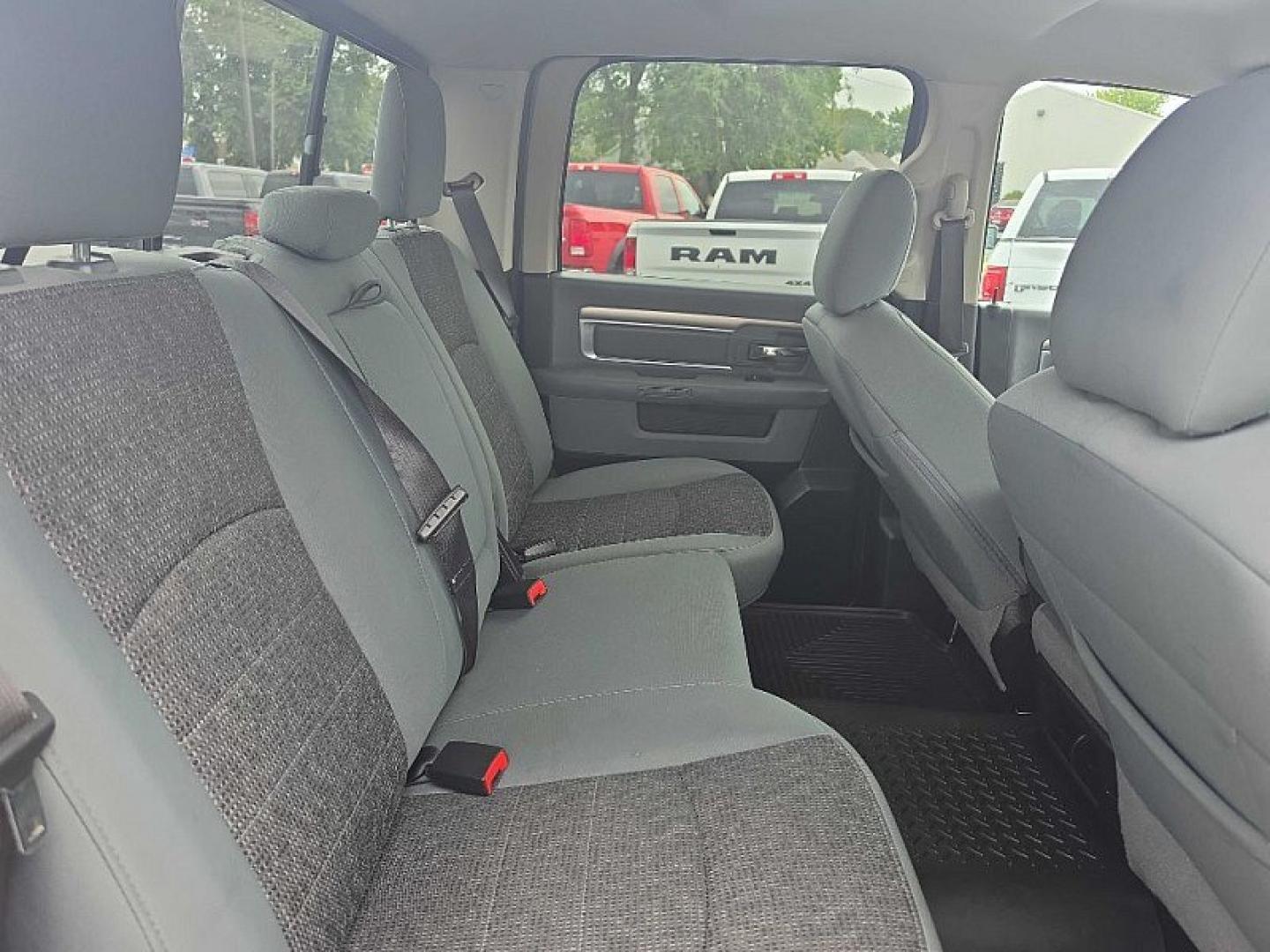 2019 BLACK /BLACK RAM 1500 SLT Crew Cab SWB 4WD (1C6RR7LT9KS) with an 5.7L V8 OHV 16V engine, 8A transmission, located at 3304 Woodville Road, Northwood, OH, 43619, (419) 210-8019, 41.612694, -83.480743 - Your #1 Destination for Auto Loans and mdash;No Matter Your Credit!At our dealership, we believe everyone deserves the opportunity to drive their dream car and mdash;whether you have good credit, bad credit, or no credit at all. With a wide selection of hundreds of cars, trucks, and SUVs, you'll fin- Photo#13