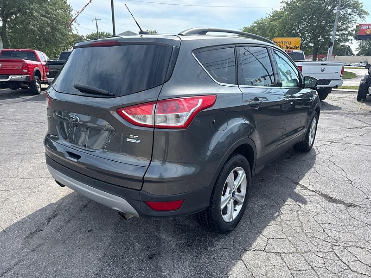 2016 GRAY /BLACK Ford Escape SE 4WD (1FMCU9GX9GU) with an 1.6L L4 DOHC 16V engine, 6A transmission, located at 3304 Woodville Road, Northwood, OH, 43619, (419) 210-8019, 41.612694, -83.480743 - Your #1 Destination for Auto Loans and mdash;No Matter Your Credit!At our dealership, we believe everyone deserves the opportunity to drive their dream car and mdash;whether you have good credit, bad credit, or no credit at all. With a wide selection of hundreds of cars, trucks, and SUVs, you'll fin- Photo#4