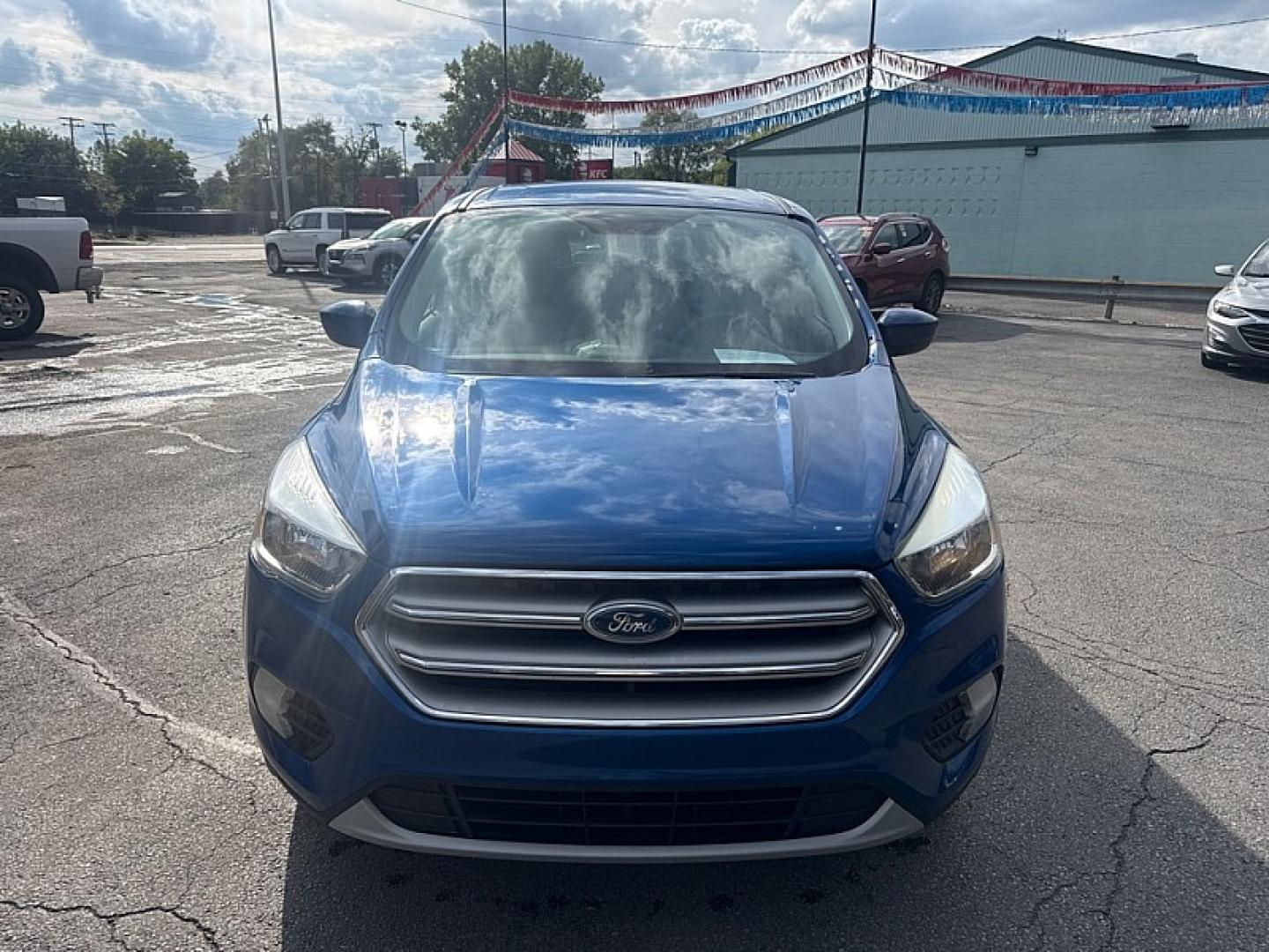 2017 BLUE /BLACK Ford Escape SE 4WD (1FMCU9GD0HU) with an 1.5L L4 DOHC 16V engine, 6A transmission, located at 3304 Woodville Road, Northwood, OH, 43619, (419) 210-8019, 41.612694, -83.480743 - Your #1 Destination for Auto Loans and mdash;No Matter Your Credit!At our dealership, we believe everyone deserves the opportunity to drive their dream car and mdash;whether you have good credit, bad credit, or no credit at all. With a wide selection of hundreds of cars, trucks, and SUVs, you'll fin- Photo#7