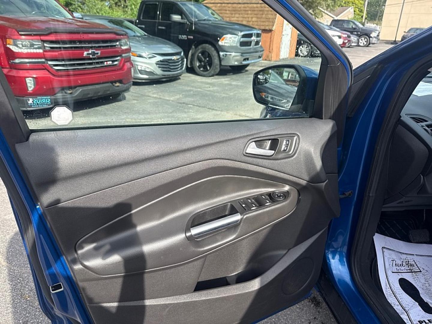 2017 BLUE /BLACK Ford Escape SE 4WD (1FMCU9GD0HU) with an 1.5L L4 DOHC 16V engine, 6A transmission, located at 3304 Woodville Road, Northwood, OH, 43619, (419) 210-8019, 41.612694, -83.480743 - Your #1 Destination for Auto Loans and mdash;No Matter Your Credit!At our dealership, we believe everyone deserves the opportunity to drive their dream car and mdash;whether you have good credit, bad credit, or no credit at all. With a wide selection of hundreds of cars, trucks, and SUVs, you'll fin- Photo#8