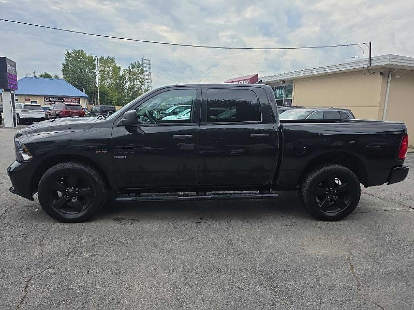 2019 BLACK /BLACK RAM 1500 Tradesman Crew Cab SWB 4WD (1C6RR7KT2KS) with an 5.7L V8 OHV 16V engine, 8A transmission, located at 3304 Woodville Road, Northwood, OH, 43619, (419) 210-8019, 41.612694, -83.480743 - Your #1 Destination for Auto Loans and mdash;No Matter Your Credit!At our dealership, we believe everyone deserves the opportunity to drive their dream car and mdash;whether you have good credit, bad credit, or no credit at all. With a wide selection of hundreds of cars, trucks, and SUVs, you'll fin- Photo#1