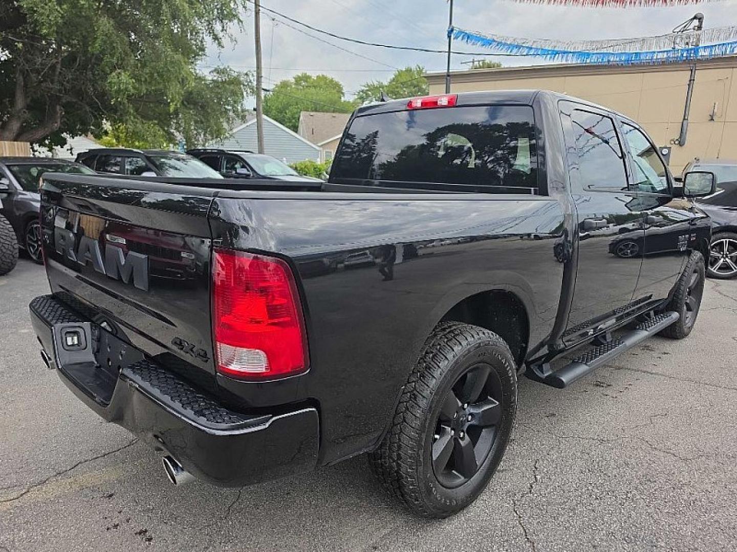 2019 BLACK /BLACK RAM 1500 Tradesman Crew Cab SWB 4WD (1C6RR7KT2KS) with an 5.7L V8 OHV 16V engine, 8A transmission, located at 3304 Woodville Road, Northwood, OH, 43619, (419) 210-8019, 41.612694, -83.480743 - Your #1 Destination for Auto Loans and mdash;No Matter Your Credit!At our dealership, we believe everyone deserves the opportunity to drive their dream car and mdash;whether you have good credit, bad credit, or no credit at all. With a wide selection of hundreds of cars, trucks, and SUVs, you'll fin- Photo#4