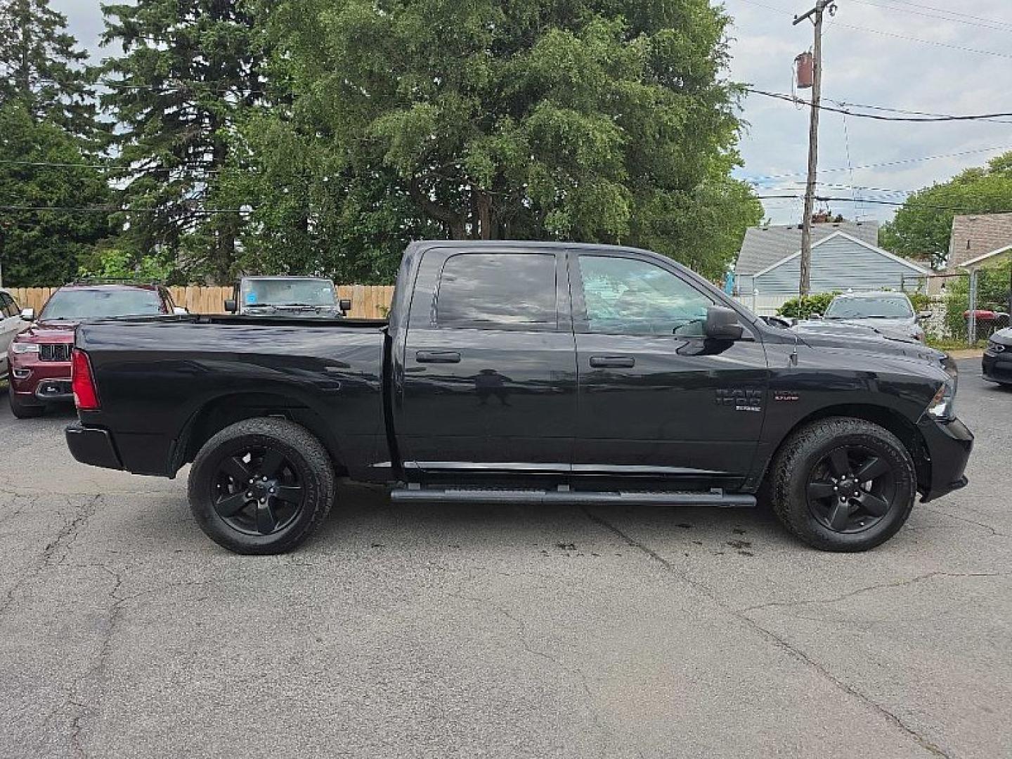 2019 BLACK /BLACK RAM 1500 Tradesman Crew Cab SWB 4WD (1C6RR7KT2KS) with an 5.7L V8 OHV 16V engine, 8A transmission, located at 3304 Woodville Road, Northwood, OH, 43619, (419) 210-8019, 41.612694, -83.480743 - Your #1 Destination for Auto Loans and mdash;No Matter Your Credit!At our dealership, we believe everyone deserves the opportunity to drive their dream car and mdash;whether you have good credit, bad credit, or no credit at all. With a wide selection of hundreds of cars, trucks, and SUVs, you'll fin- Photo#5