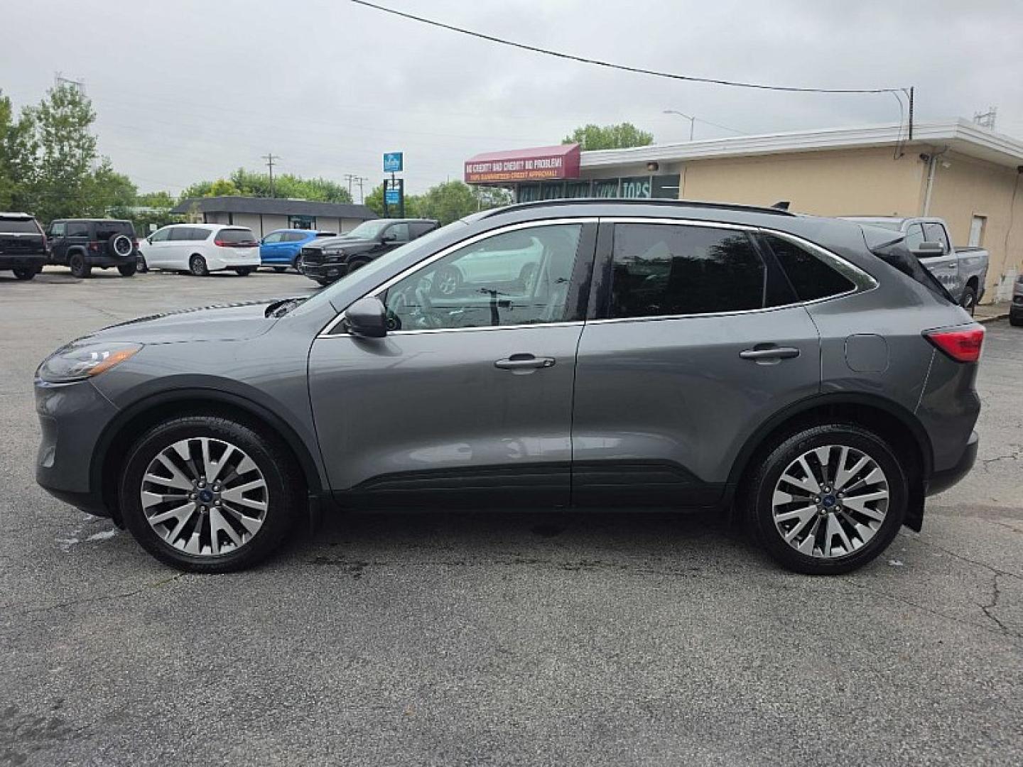 2022 GRAY /BLACK Ford Escape Titanium 4WD (1FMCU9J96NU) with an 2.0L L4 DOHC 16V engine, 6A transmission, located at 3304 Woodville Road, Northwood, OH, 43619, (419) 210-8019, 41.612694, -83.480743- Photo#3