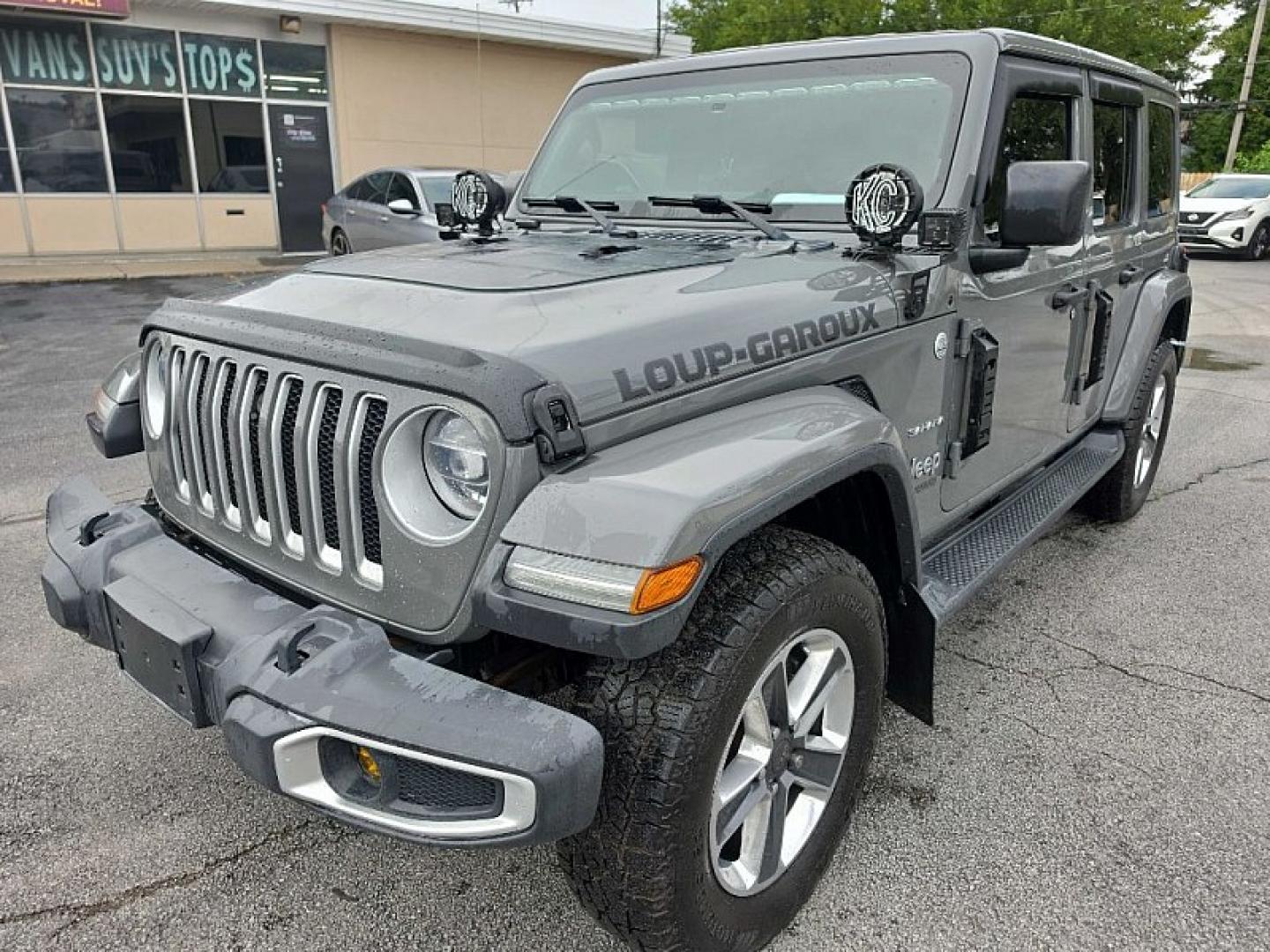 2019 GRAY /BLACK Jeep Wrangler Unlimited Sahara (1C4HJXEG2KW) with an 3.6L V6 DOHC 24V FFV engine, 6A transmission, located at 3304 Woodville Road, Northwood, OH, 43619, (419) 210-8019, 41.612694, -83.480743 - Your #1 Destination for Auto Loans and mdash;No Matter Your Credit!At our dealership, we believe everyone deserves the opportunity to drive their dream car and mdash;whether you have good credit, bad credit, or no credit at all. With a wide selection of hundreds of cars, trucks, and SUVs, you'll fin- Photo#0