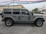 2019 GRAY /BLACK Jeep Wrangler Unlimited Sahara (1C4HJXEG2KW) with an 3.6L V6 DOHC 24V FFV engine, 6A transmission, located at 3304 Woodville Road, Northwood, OH, 43619, (419) 210-8019, 41.612694, -83.480743 - Your #1 Destination for Auto Loans and mdash;No Matter Your Credit!At our dealership, we believe everyone deserves the opportunity to drive their dream car and mdash;whether you have good credit, bad credit, or no credit at all. With a wide selection of hundreds of cars, trucks, and SUVs, you'll fin- Photo#5