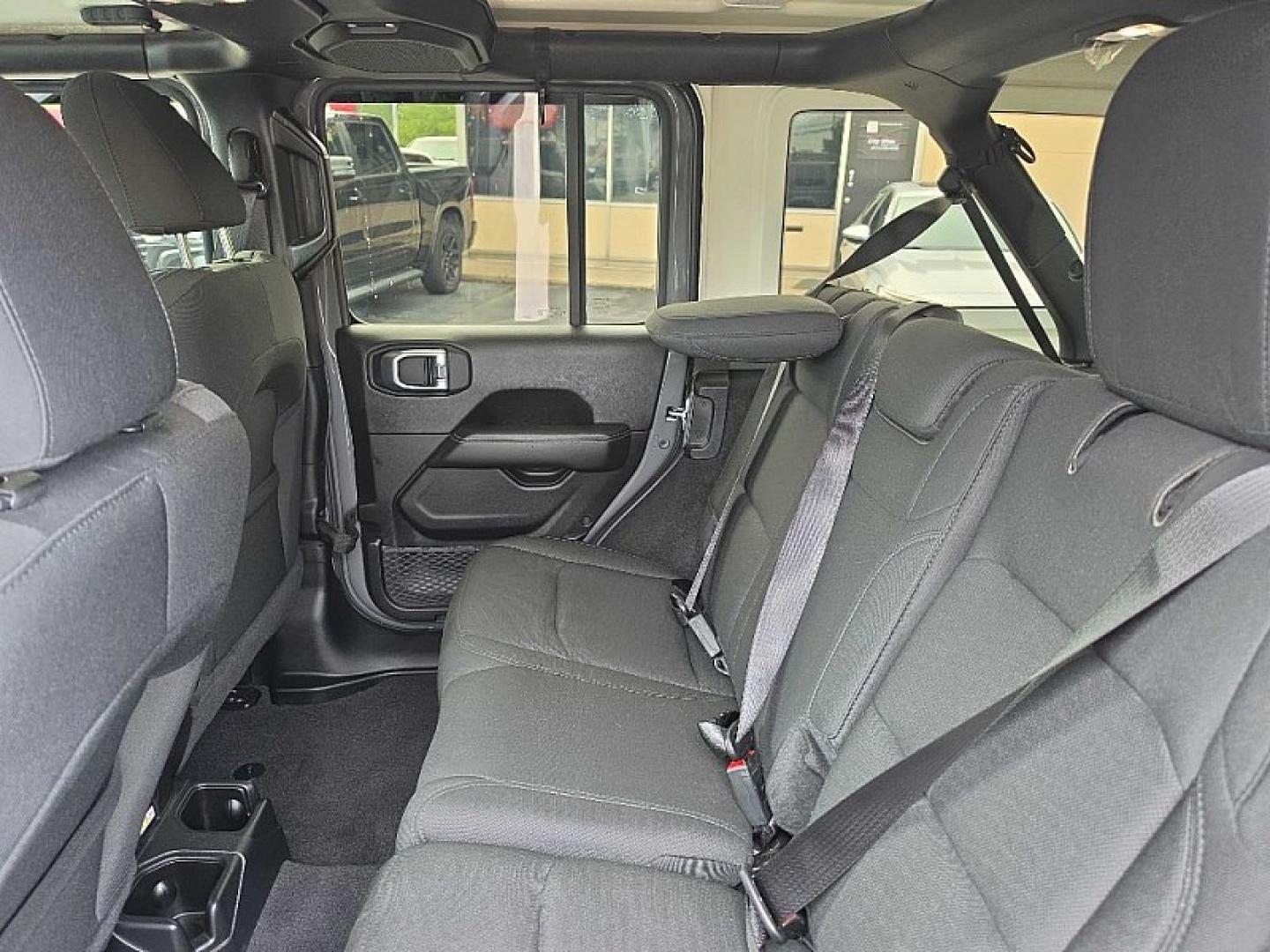 2019 GRAY /BLACK Jeep Wrangler Unlimited Sahara (1C4HJXEG2KW) with an 3.6L V6 DOHC 24V FFV engine, 6A transmission, located at 3304 Woodville Road, Northwood, OH, 43619, (419) 210-8019, 41.612694, -83.480743 - Your #1 Destination for Auto Loans and mdash;No Matter Your Credit!At our dealership, we believe everyone deserves the opportunity to drive their dream car and mdash;whether you have good credit, bad credit, or no credit at all. With a wide selection of hundreds of cars, trucks, and SUVs, you'll fin- Photo#12