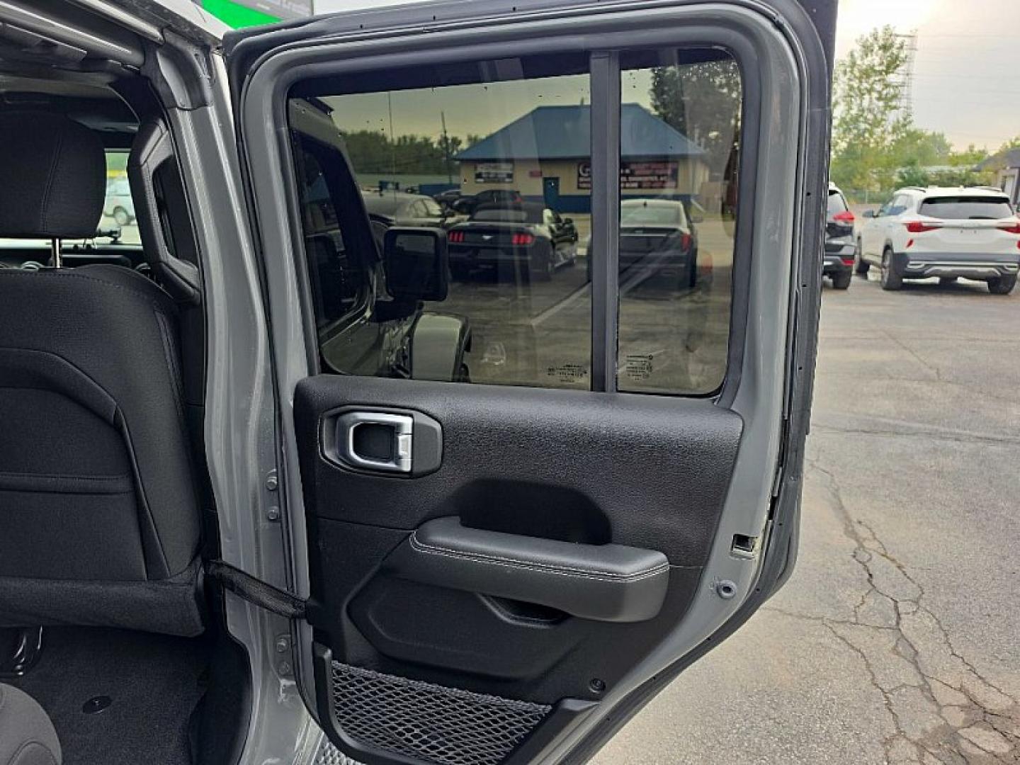 2019 GRAY /BLACK Jeep Wrangler Unlimited Sahara (1C4HJXEG2KW) with an 3.6L V6 DOHC 24V FFV engine, 6A transmission, located at 3304 Woodville Road, Northwood, OH, 43619, (419) 210-8019, 41.612694, -83.480743 - Your #1 Destination for Auto Loans and mdash;No Matter Your Credit!At our dealership, we believe everyone deserves the opportunity to drive their dream car and mdash;whether you have good credit, bad credit, or no credit at all. With a wide selection of hundreds of cars, trucks, and SUVs, you'll fin- Photo#13