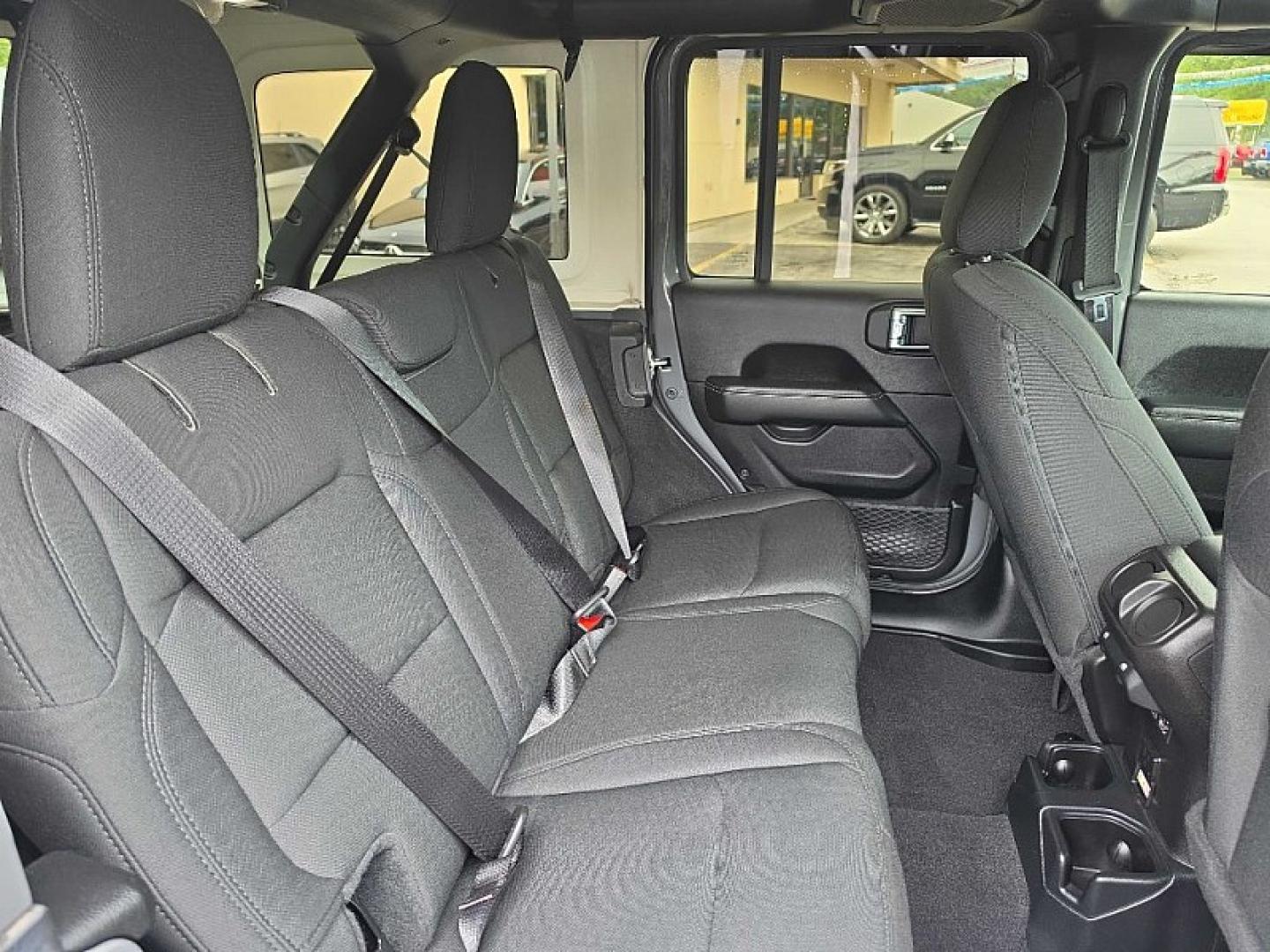 2019 GRAY /BLACK Jeep Wrangler Unlimited Sahara (1C4HJXEG2KW) with an 3.6L V6 DOHC 24V FFV engine, 6A transmission, located at 3304 Woodville Road, Northwood, OH, 43619, (419) 210-8019, 41.612694, -83.480743 - Your #1 Destination for Auto Loans and mdash;No Matter Your Credit!At our dealership, we believe everyone deserves the opportunity to drive their dream car and mdash;whether you have good credit, bad credit, or no credit at all. With a wide selection of hundreds of cars, trucks, and SUVs, you'll fin- Photo#14