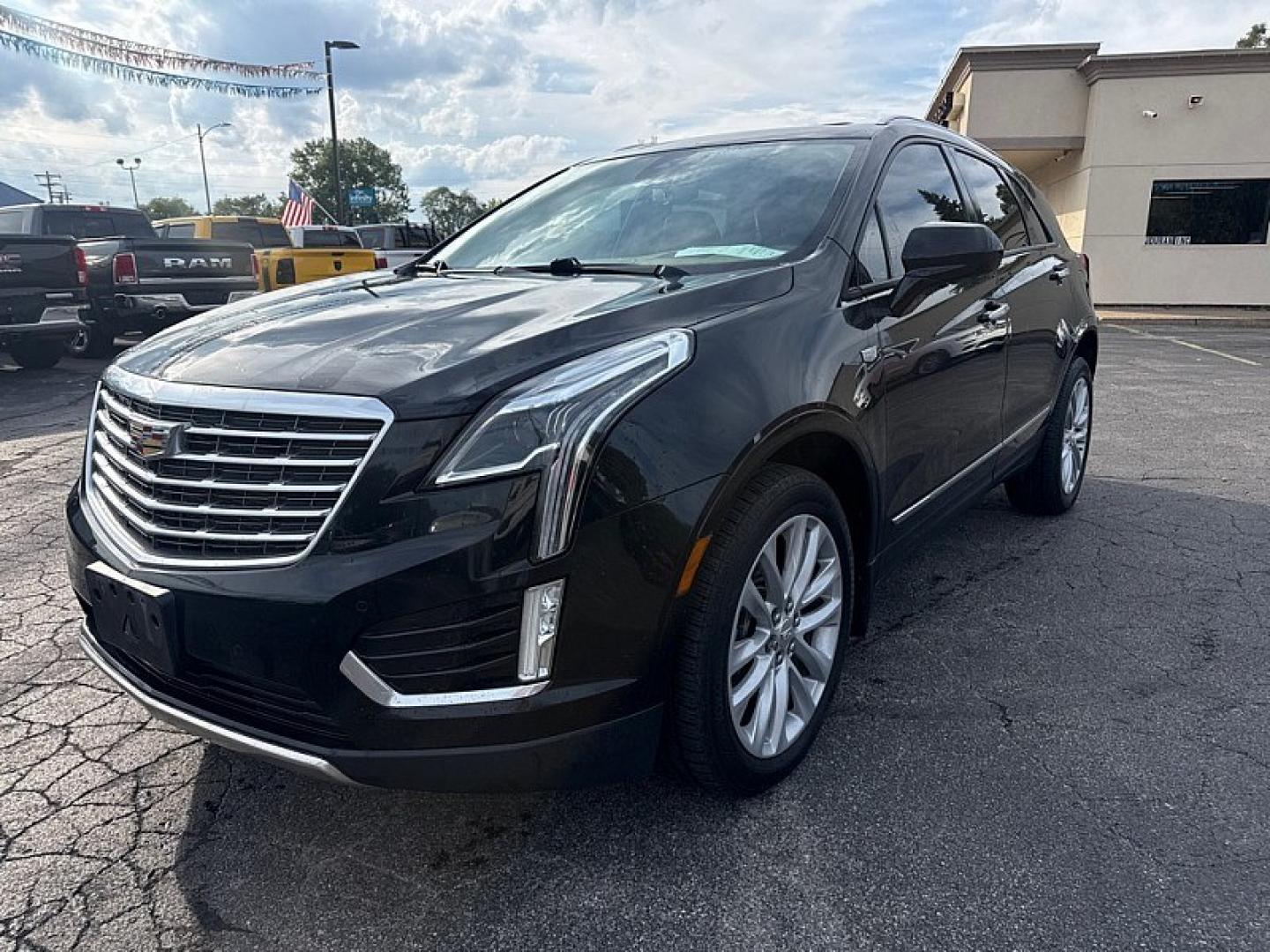 2017 BLACK /BEIGE Cadillac XT5 Platinum AWD (1GYKNFRS6HZ) with an 3.6L V6 DOHC 24V engine, 8A transmission, located at 3304 Woodville Road, Northwood, OH, 43619, (419) 210-8019, 41.612694, -83.480743 - Your #1 Destination for Auto Loans and mdash;No Matter Your Credit!At our dealership, we believe everyone deserves the opportunity to drive their dream car and mdash;whether you have good credit, bad credit, or no credit at all. With a wide selection of hundreds of cars, trucks, and SUVs, you'll fin- Photo#0