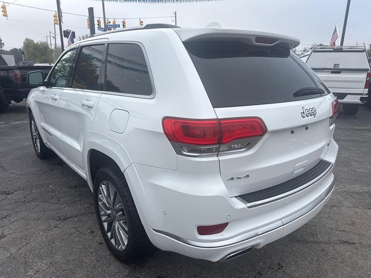 2017 WHITE /BLACK Jeep Grand Cherokee Summit 4WD (1C4RJFJG4HC) with an 3.6L V6 DOHC 24V engine, 8A transmission, located at 3304 Woodville Road, Northwood, OH, 43619, (419) 210-8019, 41.612694, -83.480743 - Your #1 Destination for Auto Loans and mdash;No Matter Your Credit!At our dealership, we believe everyone deserves the opportunity to drive their dream car and mdash;whether you have good credit, bad credit, or no credit at all. With a wide selection of hundreds of cars, trucks, and SUVs, you'll fin- Photo#2