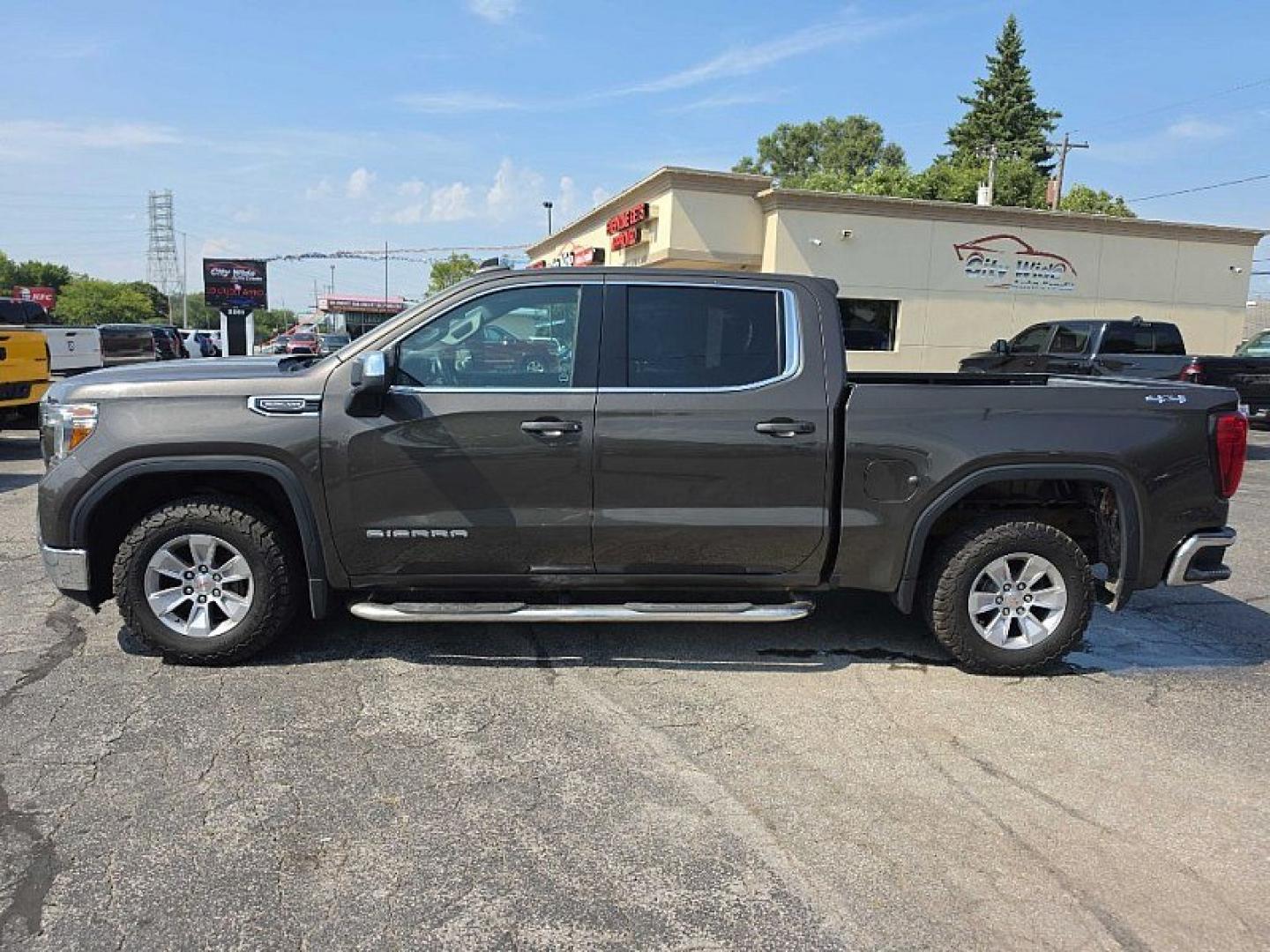 2019 GRAY /BLACK GMC Sierra 1500 SLE Crew Cab Short Box 4WD (1GTU9BED0KZ) with an 5.3L V8 OHV 16V engine, 6A transmission, located at 3304 Woodville Road, Northwood, OH, 43619, (419) 210-8019, 41.612694, -83.480743 - Your #1 Destination for Auto Loans and mdash;No Matter Your Credit!At our dealership, we believe everyone deserves the opportunity to drive their dream car and mdash;whether you have good credit, bad credit, or no credit at all. With a wide selection of hundreds of cars, trucks, and SUVs, you'll fin- Photo#0