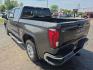 2019 GRAY /BLACK GMC Sierra 1500 SLE Crew Cab Short Box 4WD (1GTU9BED0KZ) with an 5.3L V8 OHV 16V engine, 6A transmission, located at 3304 Woodville Road, Northwood, OH, 43619, (419) 210-8019, 41.612694, -83.480743 - Your #1 Destination for Auto Loans and mdash;No Matter Your Credit!At our dealership, we believe everyone deserves the opportunity to drive their dream car and mdash;whether you have good credit, bad credit, or no credit at all. With a wide selection of hundreds of cars, trucks, and SUVs, you'll fin- Photo#3