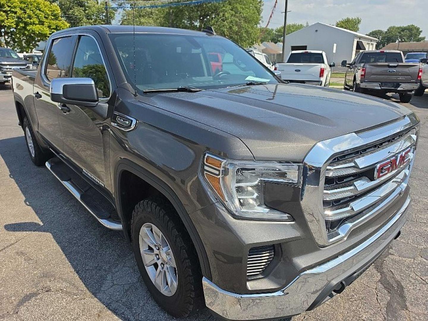 2019 GRAY /BLACK GMC Sierra 1500 SLE Crew Cab Short Box 4WD (1GTU9BED0KZ) with an 5.3L V8 OHV 16V engine, 6A transmission, located at 3304 Woodville Road, Northwood, OH, 43619, (419) 210-8019, 41.612694, -83.480743 - Your #1 Destination for Auto Loans and mdash;No Matter Your Credit!At our dealership, we believe everyone deserves the opportunity to drive their dream car and mdash;whether you have good credit, bad credit, or no credit at all. With a wide selection of hundreds of cars, trucks, and SUVs, you'll fin- Photo#6
