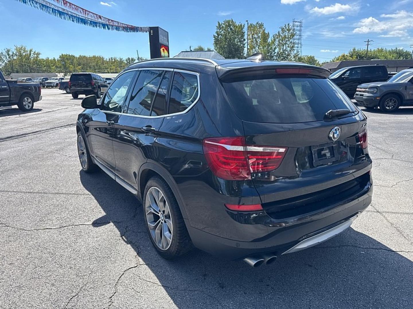 2015 BLACK /BROWN/BLACK BMW X3 xDrive28i (5UXWX9C53F0) with an 2.0L L4 DOHC 16V engine, 8-Speed Automatic transmission, located at 3304 Woodville Road, Northwood, OH, 43619, (419) 210-8019, 41.612694, -83.480743 - Your #1 Destination for Auto Loans and mdash;No Matter Your Credit!At our dealership, we believe everyone deserves the opportunity to drive their dream car and mdash;whether you have good credit, bad credit, or no credit at all. With a wide selection of hundreds of cars, trucks, and SUVs, you'll fin- Photo#2