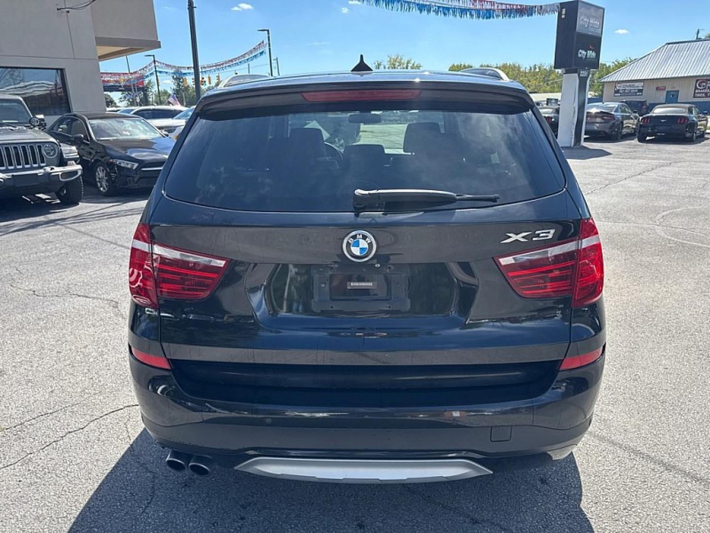 2015 BLACK /BROWN/BLACK BMW X3 xDrive28i (5UXWX9C53F0) with an 2.0L L4 DOHC 16V engine, 8-Speed Automatic transmission, located at 3304 Woodville Road, Northwood, OH, 43619, (419) 210-8019, 41.612694, -83.480743 - Your #1 Destination for Auto Loans and mdash;No Matter Your Credit!At our dealership, we believe everyone deserves the opportunity to drive their dream car and mdash;whether you have good credit, bad credit, or no credit at all. With a wide selection of hundreds of cars, trucks, and SUVs, you'll fin- Photo#3