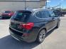 2015 BLACK /BROWN/BLACK BMW X3 xDrive28i (5UXWX9C53F0) with an 2.0L L4 DOHC 16V engine, 8-Speed Automatic transmission, located at 3304 Woodville Road, Northwood, OH, 43619, (419) 210-8019, 41.612694, -83.480743 - Your #1 Destination for Auto Loans and mdash;No Matter Your Credit!At our dealership, we believe everyone deserves the opportunity to drive their dream car and mdash;whether you have good credit, bad credit, or no credit at all. With a wide selection of hundreds of cars, trucks, and SUVs, you'll fin- Photo#4
