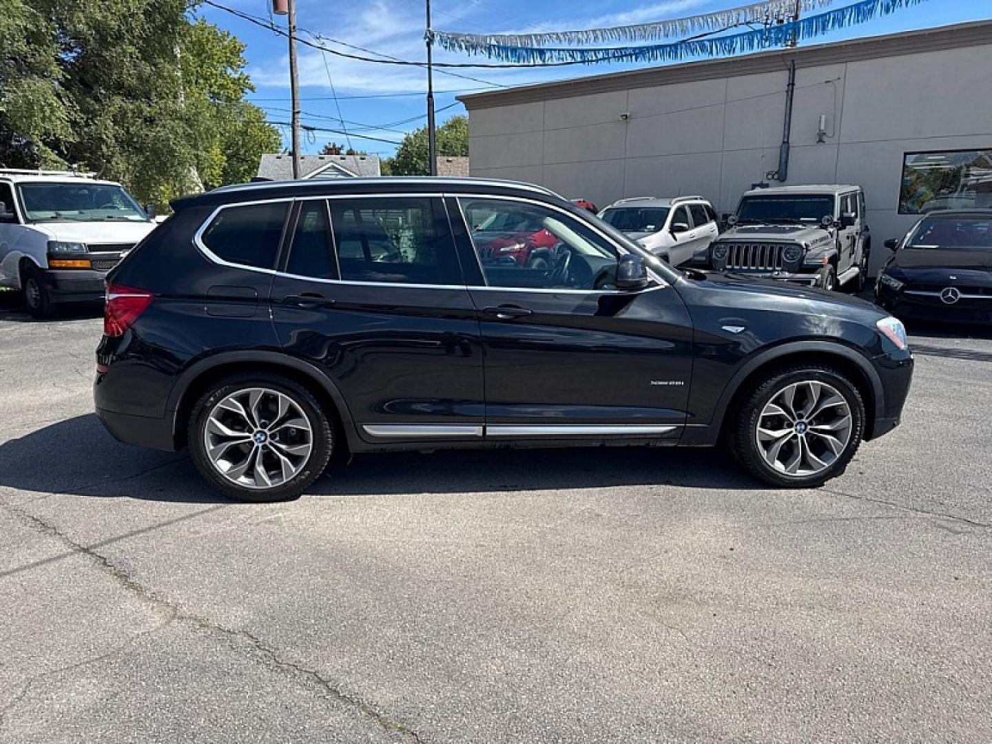 2015 BLACK /BROWN/BLACK BMW X3 xDrive28i (5UXWX9C53F0) with an 2.0L L4 DOHC 16V engine, 8-Speed Automatic transmission, located at 3304 Woodville Road, Northwood, OH, 43619, (419) 210-8019, 41.612694, -83.480743 - Your #1 Destination for Auto Loans and mdash;No Matter Your Credit!At our dealership, we believe everyone deserves the opportunity to drive their dream car and mdash;whether you have good credit, bad credit, or no credit at all. With a wide selection of hundreds of cars, trucks, and SUVs, you'll fin- Photo#5
