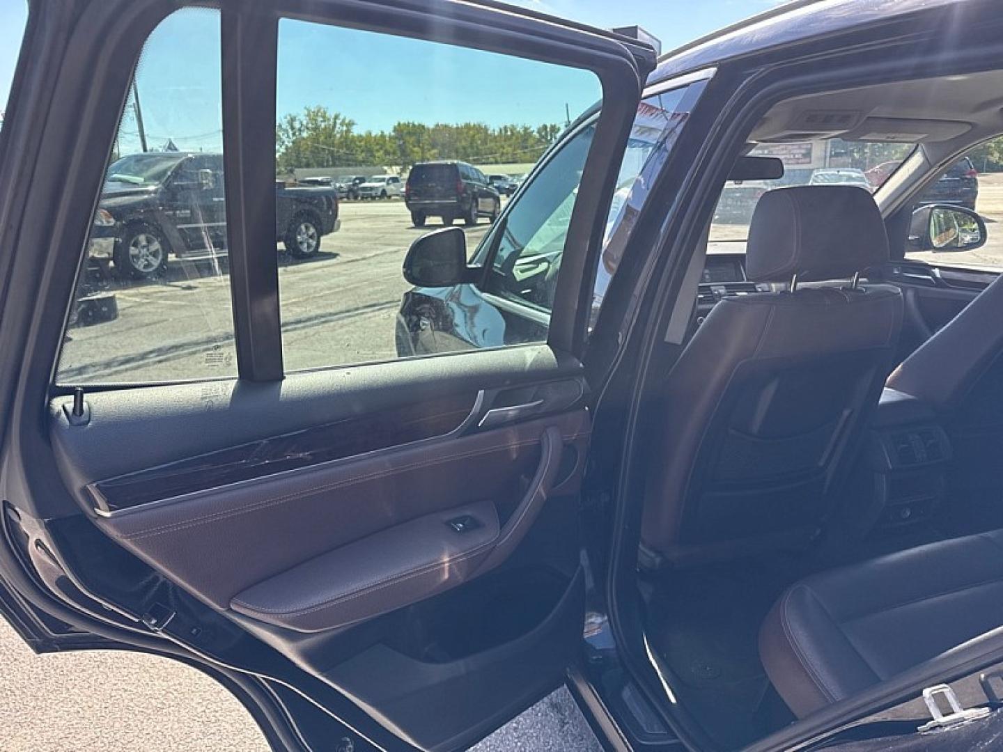 2015 BLACK /BROWN/BLACK BMW X3 xDrive28i (5UXWX9C53F0) with an 2.0L L4 DOHC 16V engine, 8-Speed Automatic transmission, located at 3304 Woodville Road, Northwood, OH, 43619, (419) 210-8019, 41.612694, -83.480743 - Your #1 Destination for Auto Loans and mdash;No Matter Your Credit!At our dealership, we believe everyone deserves the opportunity to drive their dream car and mdash;whether you have good credit, bad credit, or no credit at all. With a wide selection of hundreds of cars, trucks, and SUVs, you'll fin- Photo#10