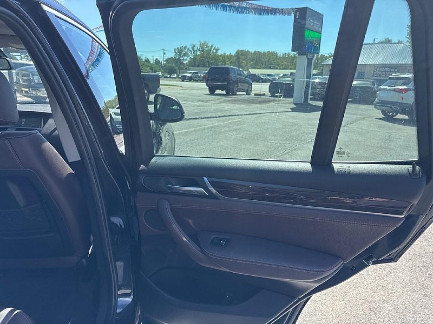 2015 BLACK /BROWN/BLACK BMW X3 xDrive28i (5UXWX9C53F0) with an 2.0L L4 DOHC 16V engine, 8-Speed Automatic transmission, located at 3304 Woodville Road, Northwood, OH, 43619, (419) 210-8019, 41.612694, -83.480743 - Your #1 Destination for Auto Loans and mdash;No Matter Your Credit!At our dealership, we believe everyone deserves the opportunity to drive their dream car and mdash;whether you have good credit, bad credit, or no credit at all. With a wide selection of hundreds of cars, trucks, and SUVs, you'll fin- Photo#12