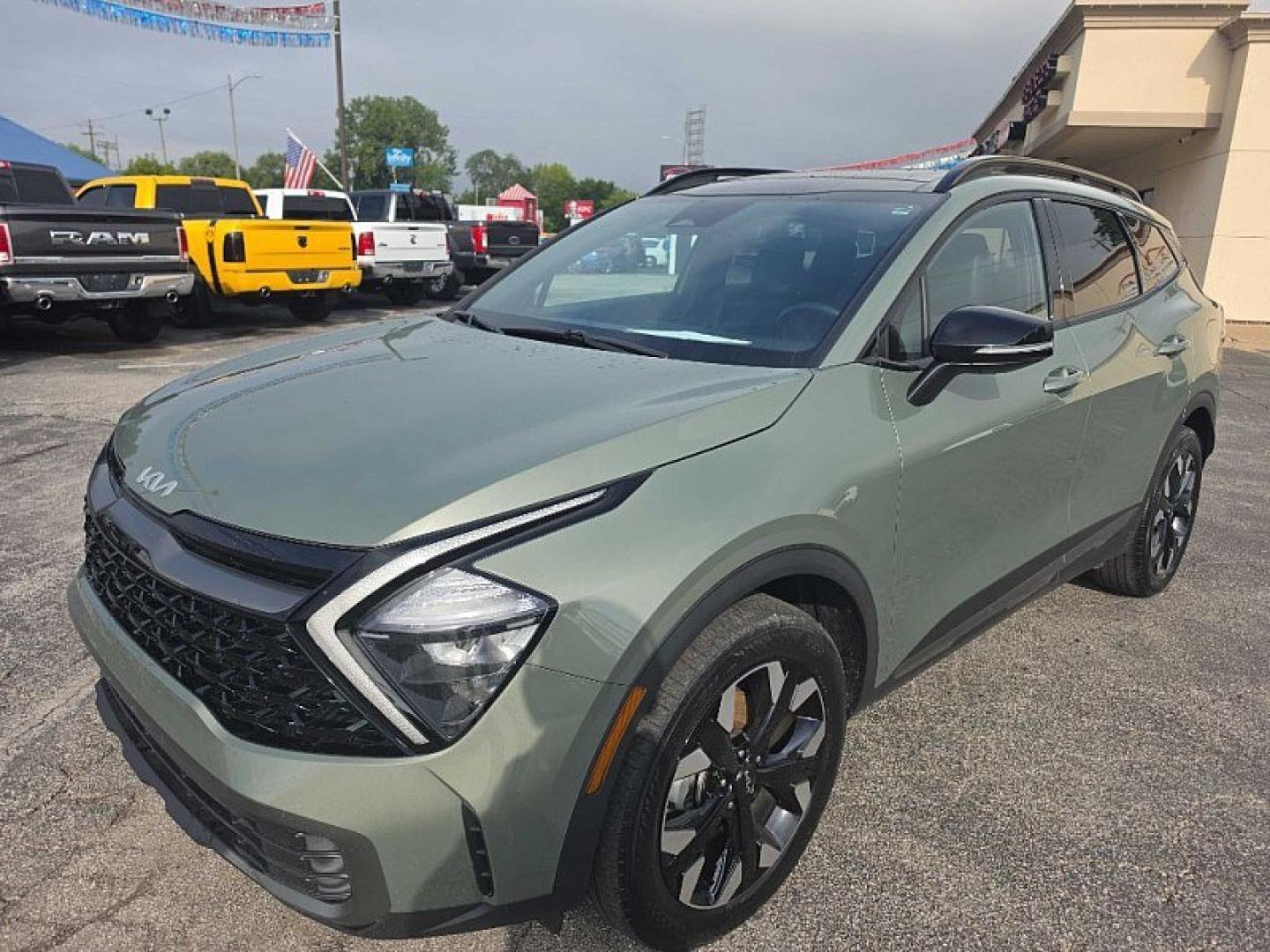 2023 GREEN Kia Sportage X Line AWD (5XYK6CAF1PG) with an 2.4L V6 DOHC 24V engine, 6A transmission, located at 3304 Woodville Road, Northwood, OH, 43619, (419) 210-8019, 41.612694, -83.480743 - Your #1 Destination for Auto Loans and mdash;No Matter Your Credit!At our dealership, we believe everyone deserves the opportunity to drive their dream car and mdash;whether you have good credit, bad credit, or no credit at all. With a wide selection of hundreds of cars, trucks, and SUVs, you'll fin- Photo#0