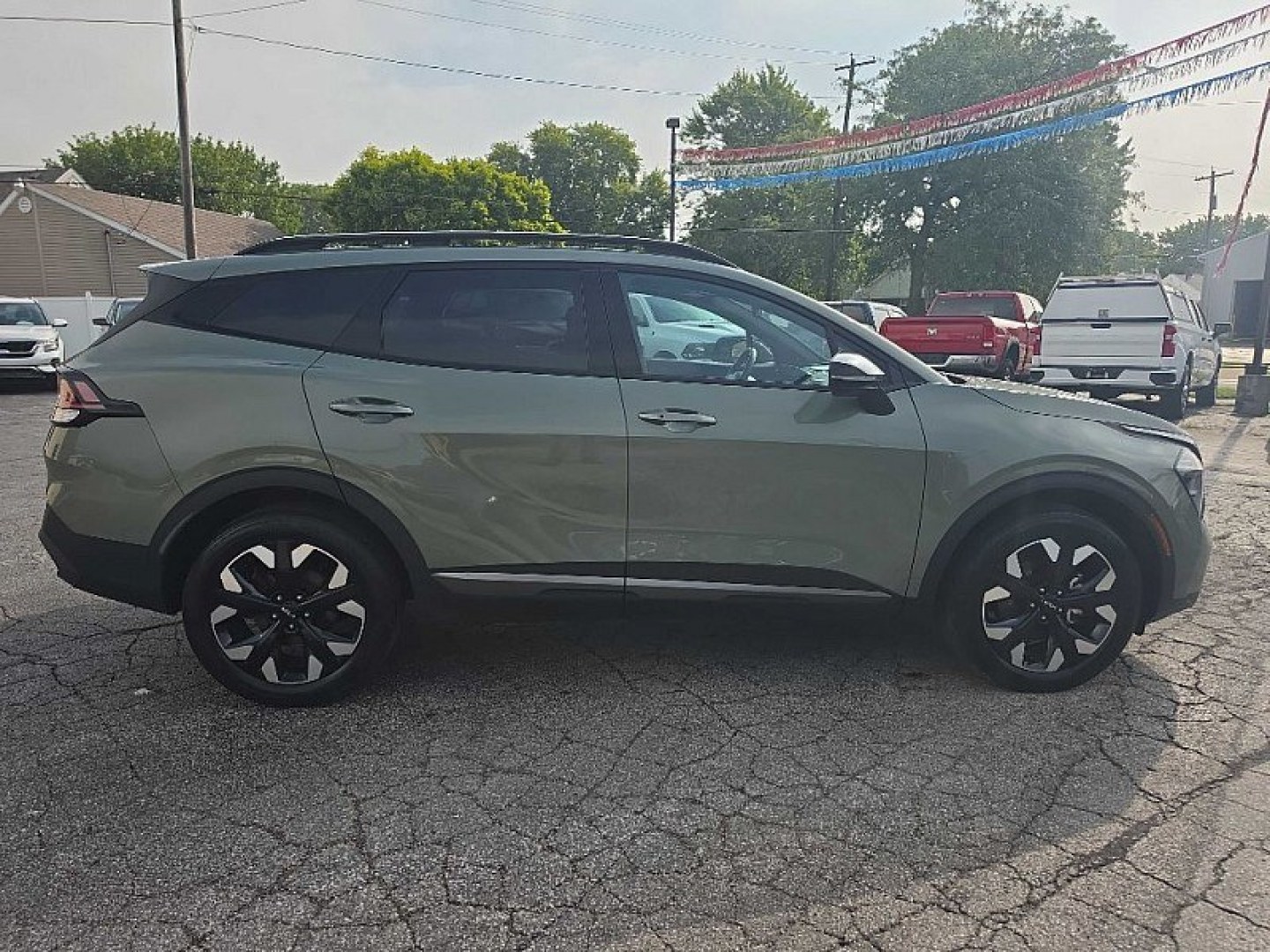 2023 GREEN Kia Sportage X Line AWD (5XYK6CAF1PG) with an 2.4L V6 DOHC 24V engine, 6A transmission, located at 3304 Woodville Road, Northwood, OH, 43619, (419) 210-8019, 41.612694, -83.480743 - Your #1 Destination for Auto Loans and mdash;No Matter Your Credit!At our dealership, we believe everyone deserves the opportunity to drive their dream car and mdash;whether you have good credit, bad credit, or no credit at all. With a wide selection of hundreds of cars, trucks, and SUVs, you'll fin- Photo#5