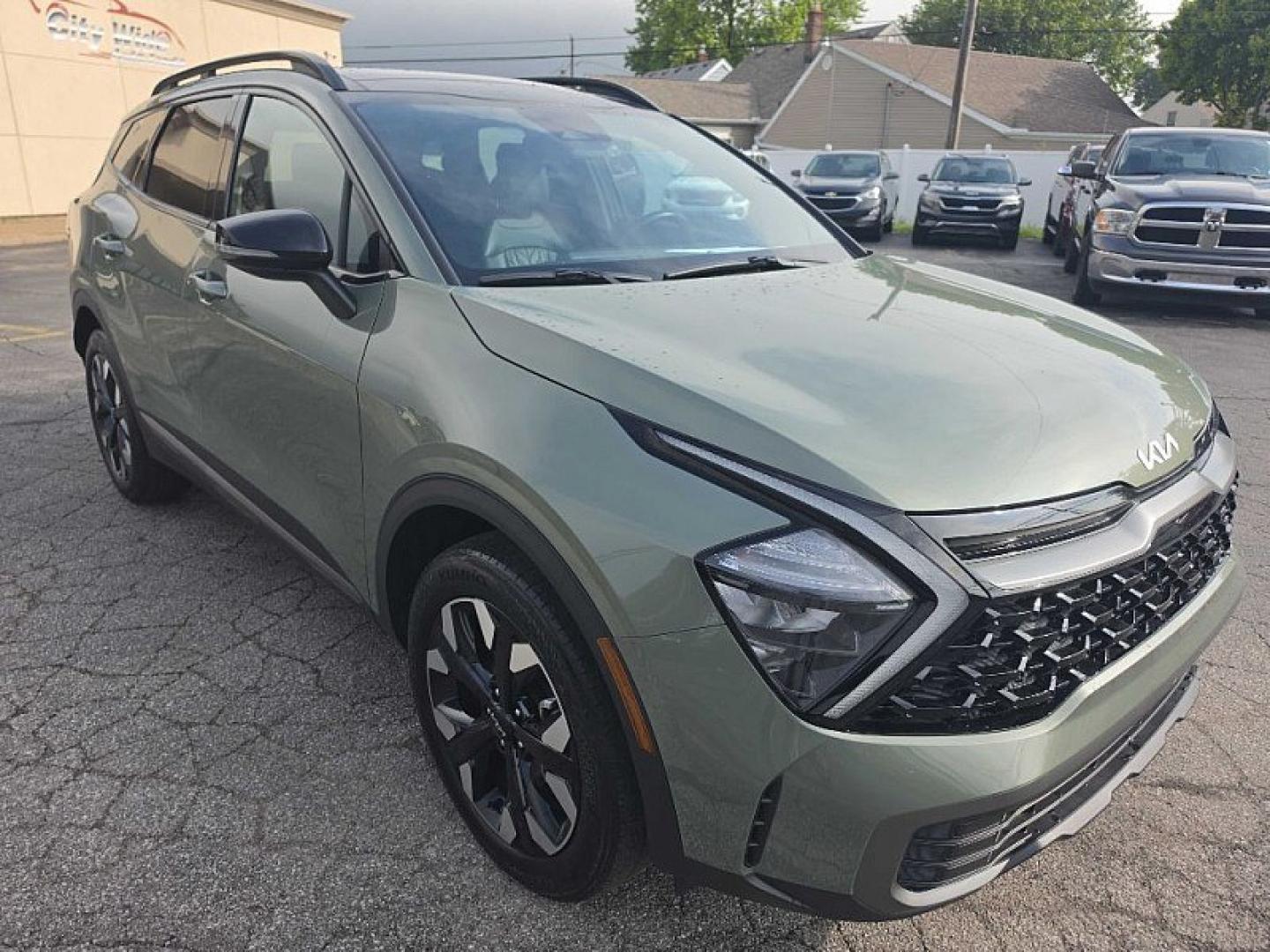 2023 GREEN Kia Sportage X Line AWD (5XYK6CAF1PG) with an 2.4L V6 DOHC 24V engine, 6A transmission, located at 3304 Woodville Road, Northwood, OH, 43619, (419) 210-8019, 41.612694, -83.480743 - Your #1 Destination for Auto Loans and mdash;No Matter Your Credit!At our dealership, we believe everyone deserves the opportunity to drive their dream car and mdash;whether you have good credit, bad credit, or no credit at all. With a wide selection of hundreds of cars, trucks, and SUVs, you'll fin- Photo#6