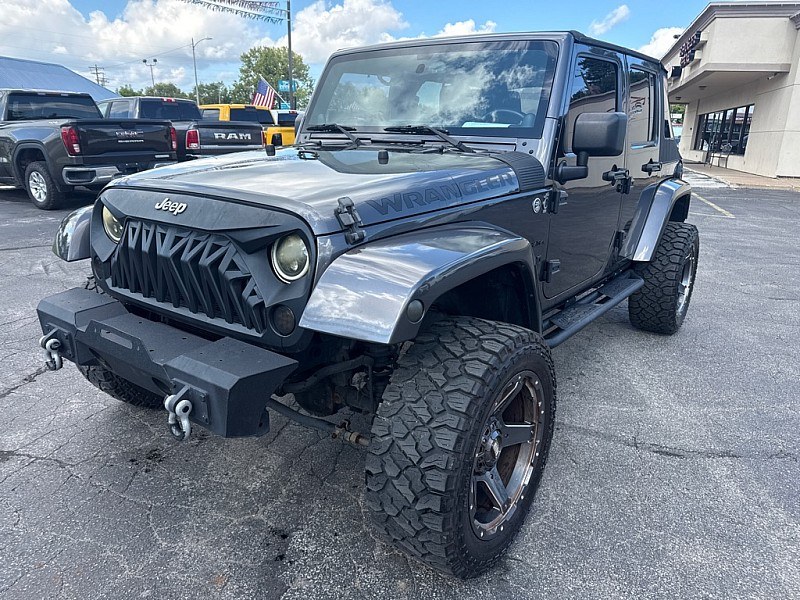 photo of 2014 Jeep Wrangler Unlimited Sahara 4WD