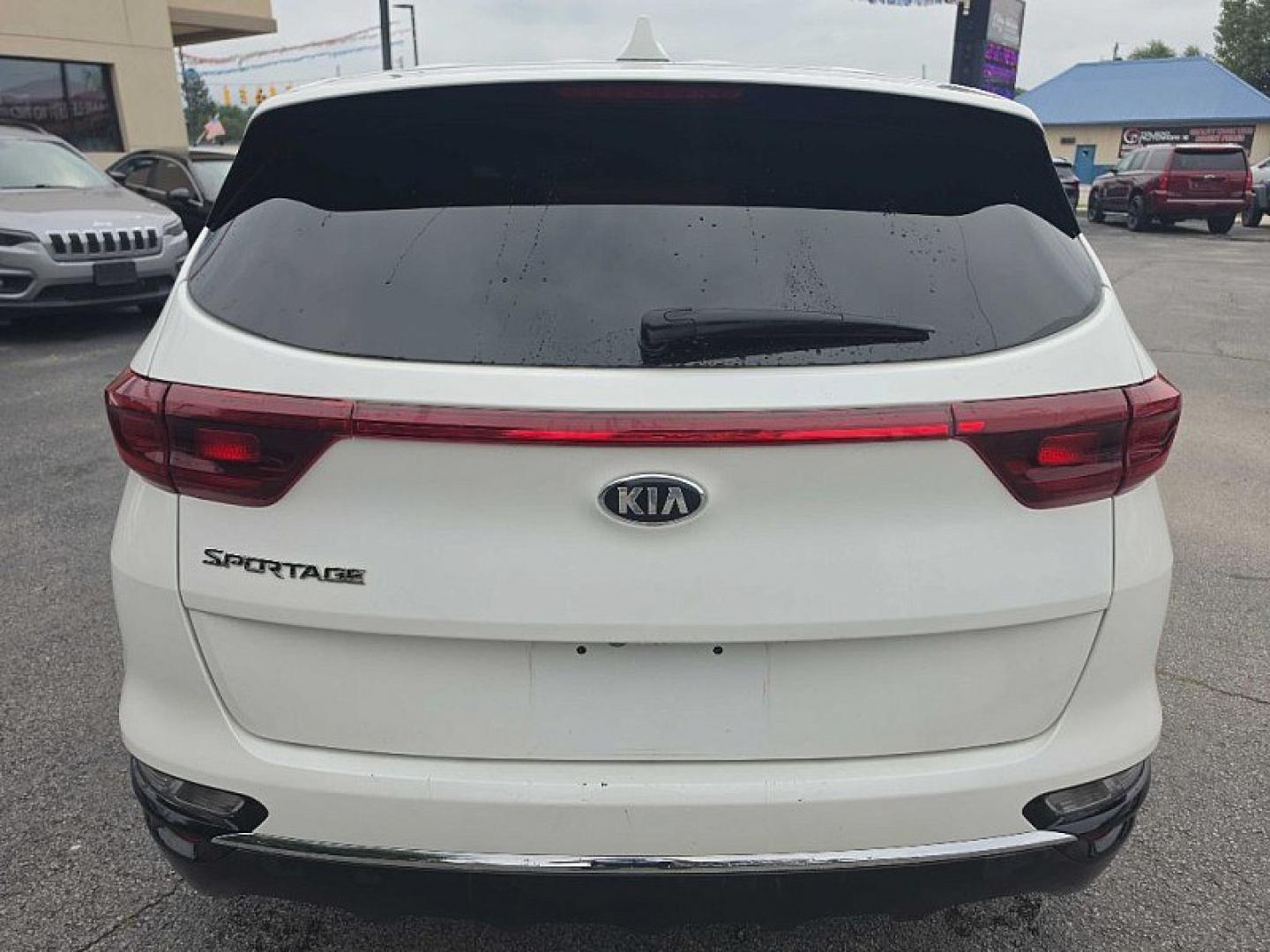 2022 WHITE /BLACK Kia Sportage LX FWD (KNDPM3ACXN7) with an 2.4L V6 DOHC 24V engine, 6A transmission, located at 3304 Woodville Road, Northwood, OH, 43619, (419) 210-8019, 41.612694, -83.480743 - Your #1 Destination for Auto Loans and mdash;No Matter Your Credit!At our dealership, we believe everyone deserves the opportunity to drive their dream car and mdash;whether you have good credit, bad credit, or no credit at all. With a wide selection of hundreds of cars, trucks, and SUVs, you'll fin- Photo#4