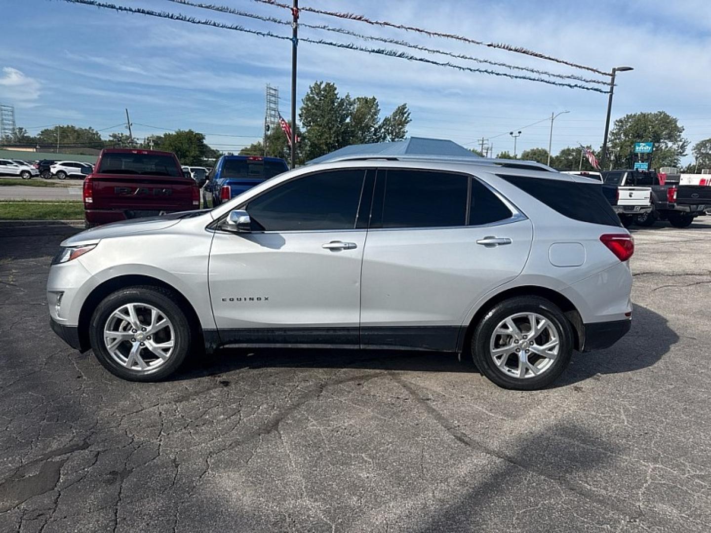 2020 SILVER /BLACK Chevrolet Equinox Premier 1.5 AWD (2GNAXXEV3L6) with an 1.5L L4 DOHC 16V TURBO engine, 6A transmission, located at 3304 Woodville Road, Northwood, OH, 43619, (419) 210-8019, 41.612694, -83.480743 - Your #1 Destination for Auto Loans and mdash;No Matter Your Credit!At our dealership, we believe everyone deserves the opportunity to drive their dream car and mdash;whether you have good credit, bad credit, or no credit at all. With a wide selection of hundreds of cars, trucks, and SUVs, you'll fin- Photo#1