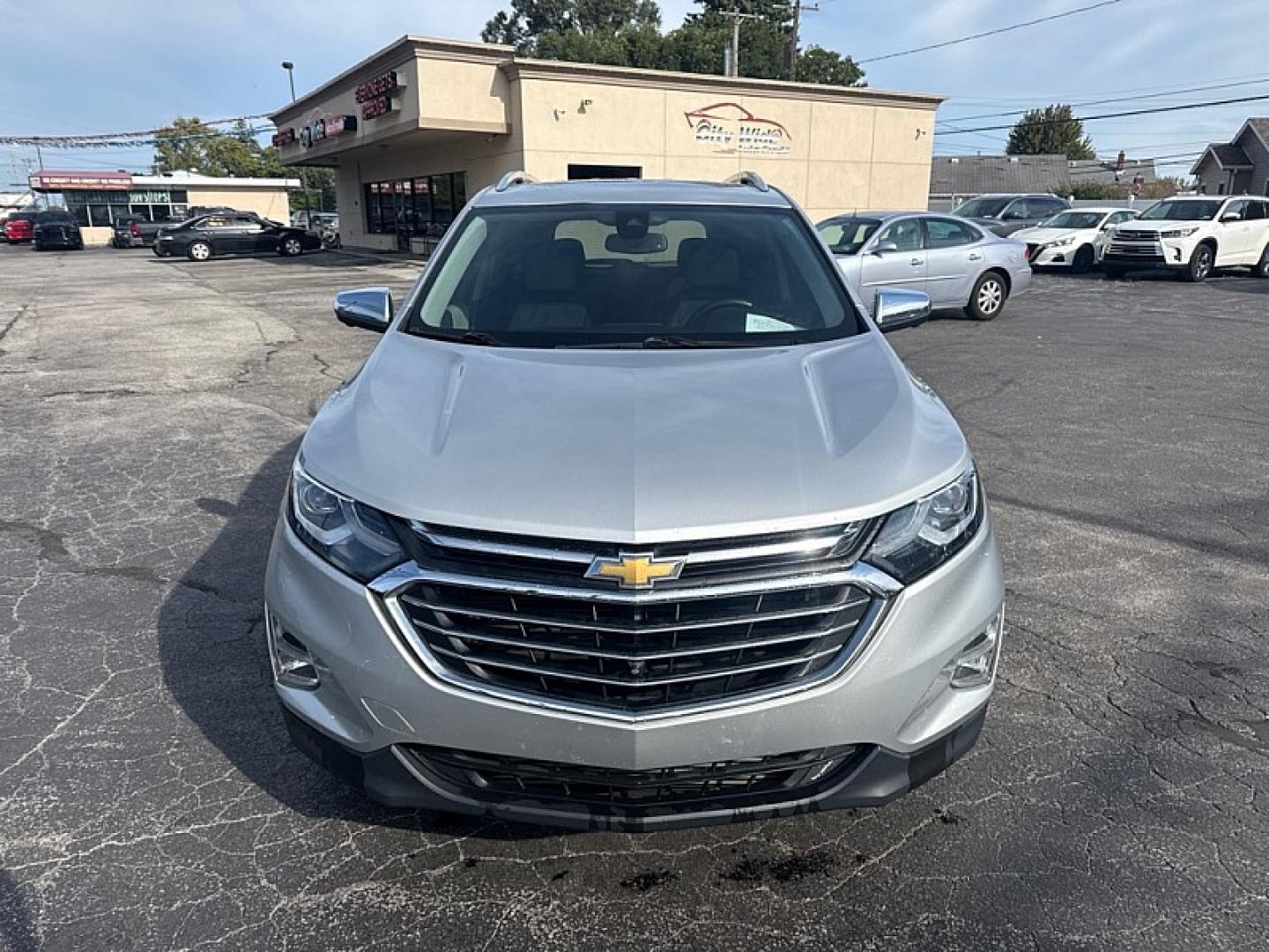 2020 SILVER /BLACK Chevrolet Equinox Premier 1.5 AWD (2GNAXXEV3L6) with an 1.5L L4 DOHC 16V TURBO engine, 6A transmission, located at 3304 Woodville Road, Northwood, OH, 43619, (419) 210-8019, 41.612694, -83.480743 - Your #1 Destination for Auto Loans and mdash;No Matter Your Credit!At our dealership, we believe everyone deserves the opportunity to drive their dream car and mdash;whether you have good credit, bad credit, or no credit at all. With a wide selection of hundreds of cars, trucks, and SUVs, you'll fin- Photo#7