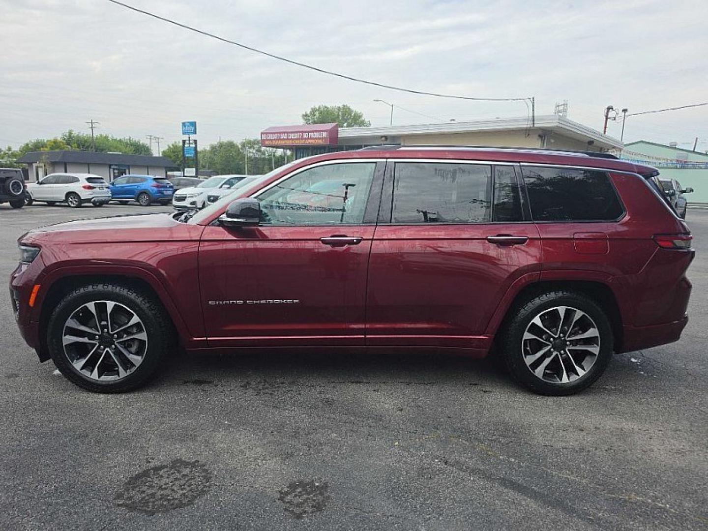 2021 RED /TAN Jeep Grand Cherokee L Overland 4WD (1C4RJKDT5M8) with an 5.7L V8 OHV 16V engine, 8A transmission, located at 3304 Woodville Road, Northwood, OH, 43619, (419) 210-8019, 41.612694, -83.480743- Photo#1