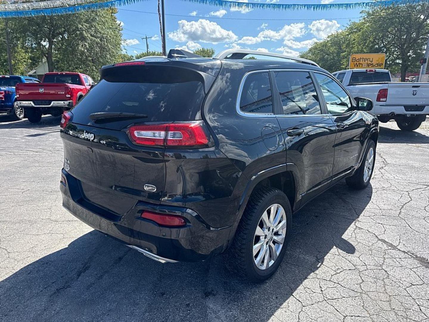 2016 BLACK /BLACK Jeep Cherokee Overland 4WD (1C4PJMJS9GW) with an 3.2L V6 DOHC 24V engine, 9A transmission, located at 3304 Woodville Road, Northwood, OH, 43619, (419) 210-8019, 41.612694, -83.480743 - Your #1 Destination for Auto Loans and mdash;No Matter Your Credit!At our dealership, we believe everyone deserves the opportunity to drive their dream car and mdash;whether you have good credit, bad credit, or no credit at all. With a wide selection of hundreds of cars, trucks, and SUVs, you'll fin- Photo#4
