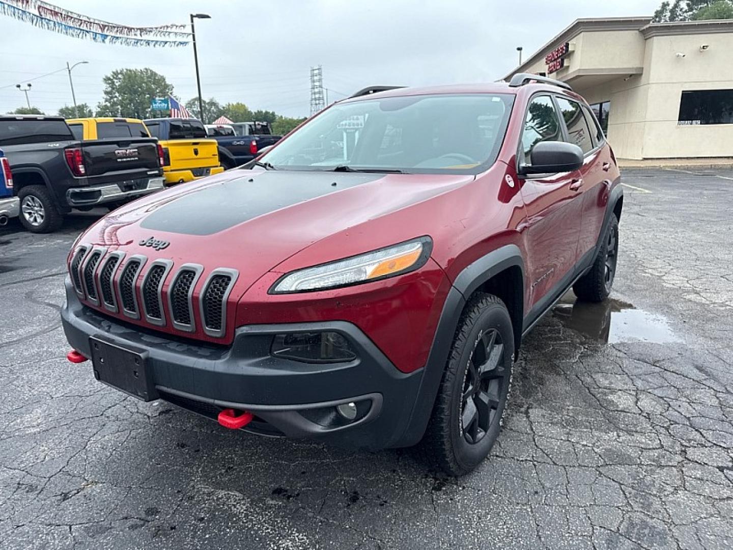 2016 RED /BLACK Jeep Cherokee Trailhawk 4WD (1C4PJMBS7GW) with an 3.2L V6 DOHC 24V engine, 9A transmission, located at 3304 Woodville Road, Northwood, OH, 43619, (419) 210-8019, 41.612694, -83.480743- Photo#0