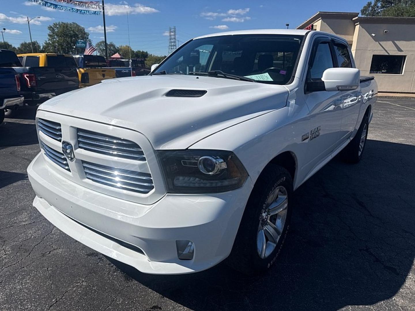 2014 WHITE /BLACK RAM 1500 Sport Crew Cab SWB 4WD (1C6RR7MT7ES) with an 5.7L V8 OHV 16V engine, 6-Speed Automatic transmission, located at 3304 Woodville Road, Northwood, OH, 43619, (419) 210-8019, 41.612694, -83.480743 - Your #1 Destination for Auto Loans and mdash;No Matter Your Credit!At our dealership, we believe everyone deserves the opportunity to drive their dream car and mdash;whether you have good credit, bad credit, or no credit at all. With a wide selection of hundreds of cars, trucks, and SUVs, you'll fin- Photo#0