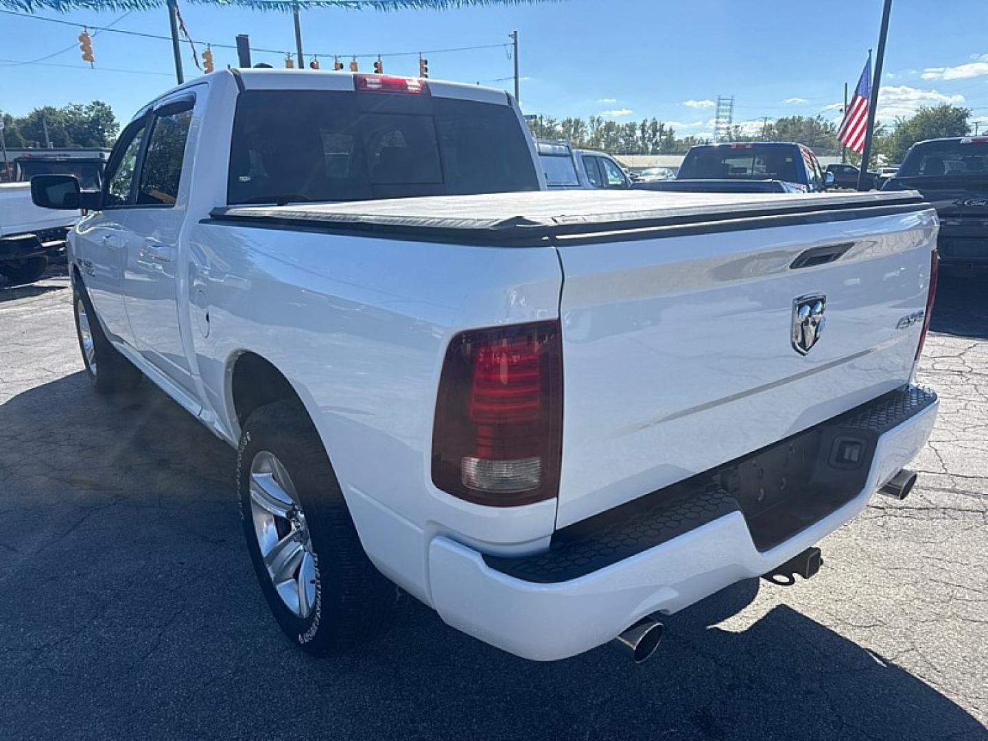 2014 WHITE /BLACK RAM 1500 Sport Crew Cab SWB 4WD (1C6RR7MT7ES) with an 5.7L V8 OHV 16V engine, 6-Speed Automatic transmission, located at 3304 Woodville Road, Northwood, OH, 43619, (419) 210-8019, 41.612694, -83.480743 - Your #1 Destination for Auto Loans and mdash;No Matter Your Credit!At our dealership, we believe everyone deserves the opportunity to drive their dream car and mdash;whether you have good credit, bad credit, or no credit at all. With a wide selection of hundreds of cars, trucks, and SUVs, you'll fin- Photo#2