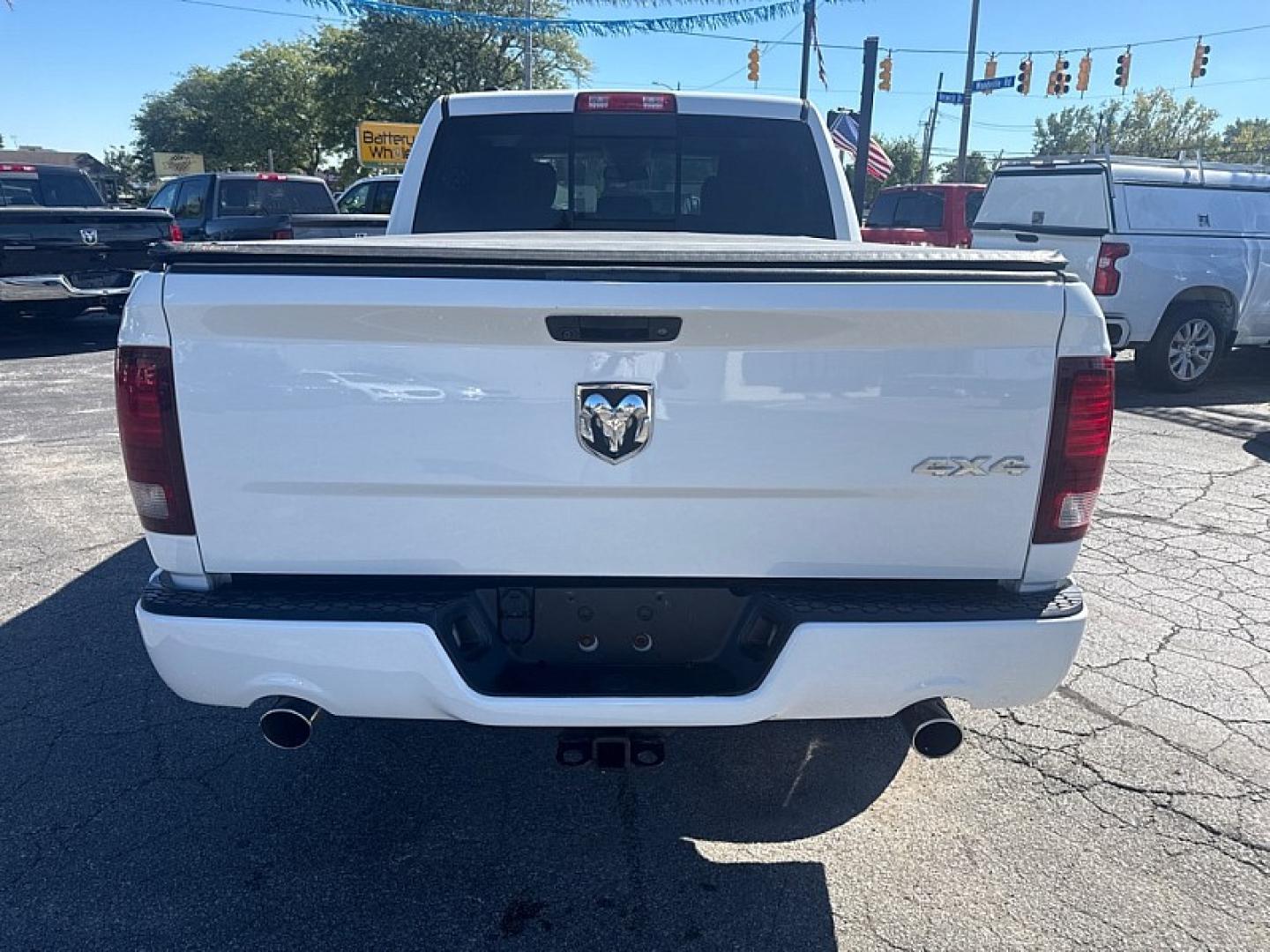 2014 WHITE /BLACK RAM 1500 Sport Crew Cab SWB 4WD (1C6RR7MT7ES) with an 5.7L V8 OHV 16V engine, 6-Speed Automatic transmission, located at 3304 Woodville Road, Northwood, OH, 43619, (419) 210-8019, 41.612694, -83.480743 - Your #1 Destination for Auto Loans and mdash;No Matter Your Credit!At our dealership, we believe everyone deserves the opportunity to drive their dream car and mdash;whether you have good credit, bad credit, or no credit at all. With a wide selection of hundreds of cars, trucks, and SUVs, you'll fin- Photo#3