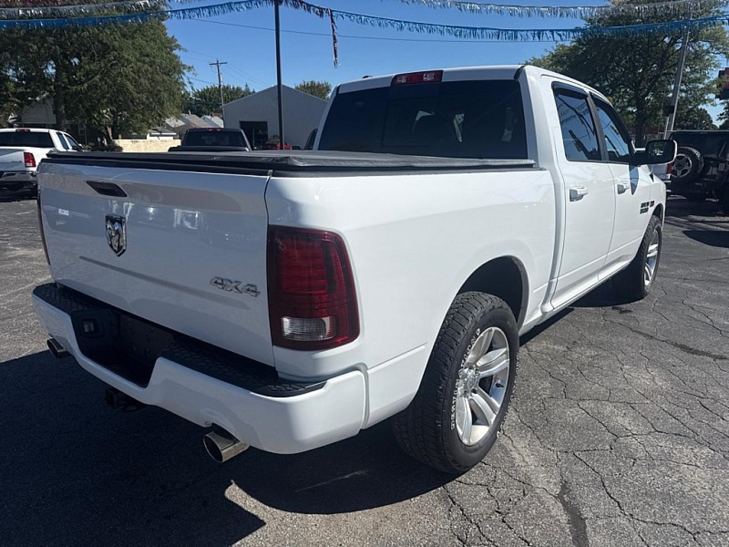 2014 WHITE /BLACK RAM 1500 Sport Crew Cab SWB 4WD (1C6RR7MT7ES) with an 5.7L V8 OHV 16V engine, 6-Speed Automatic transmission, located at 3304 Woodville Road, Northwood, OH, 43619, (419) 210-8019, 41.612694, -83.480743 - Your #1 Destination for Auto Loans and mdash;No Matter Your Credit!At our dealership, we believe everyone deserves the opportunity to drive their dream car and mdash;whether you have good credit, bad credit, or no credit at all. With a wide selection of hundreds of cars, trucks, and SUVs, you'll fin- Photo#4