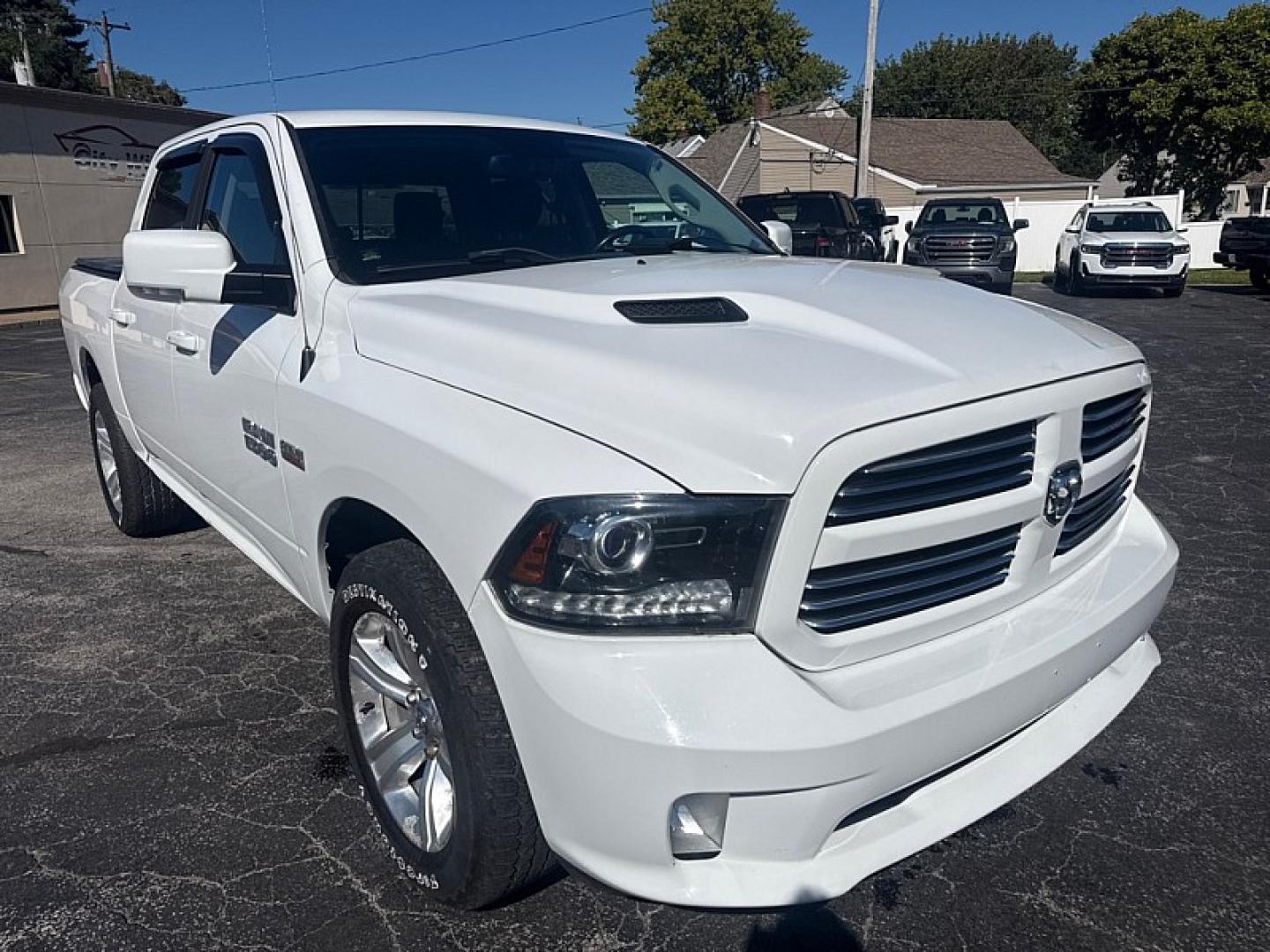 2014 WHITE /BLACK RAM 1500 Sport Crew Cab SWB 4WD (1C6RR7MT7ES) with an 5.7L V8 OHV 16V engine, 6-Speed Automatic transmission, located at 3304 Woodville Road, Northwood, OH, 43619, (419) 210-8019, 41.612694, -83.480743 - Your #1 Destination for Auto Loans and mdash;No Matter Your Credit!At our dealership, we believe everyone deserves the opportunity to drive their dream car and mdash;whether you have good credit, bad credit, or no credit at all. With a wide selection of hundreds of cars, trucks, and SUVs, you'll fin- Photo#6